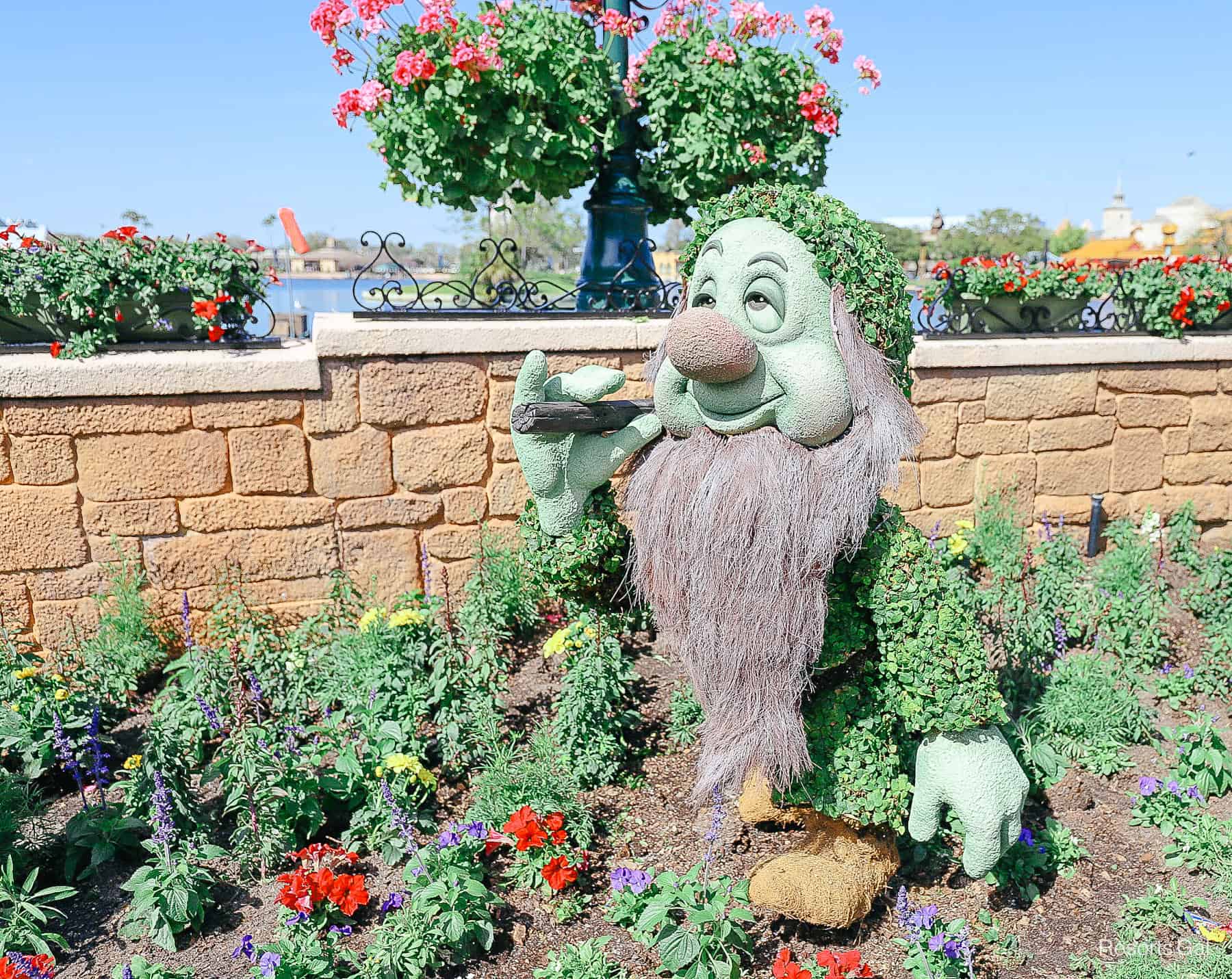 one of the Seven Dwarfs in topiary form at Epcot 