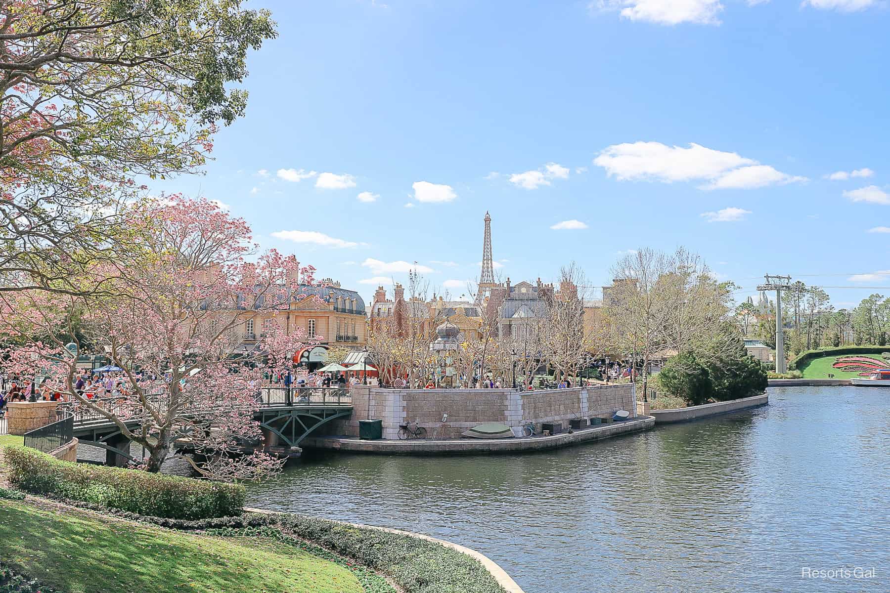 A view of the France Pavilion at Epcot with the miniature Eiffel Tower in the backdrop 