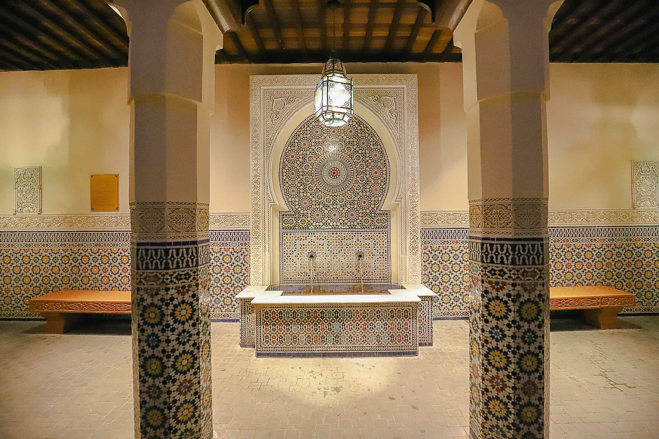 the Fez House interior with intricate tile design in Epcot's Morocco Pavilion 