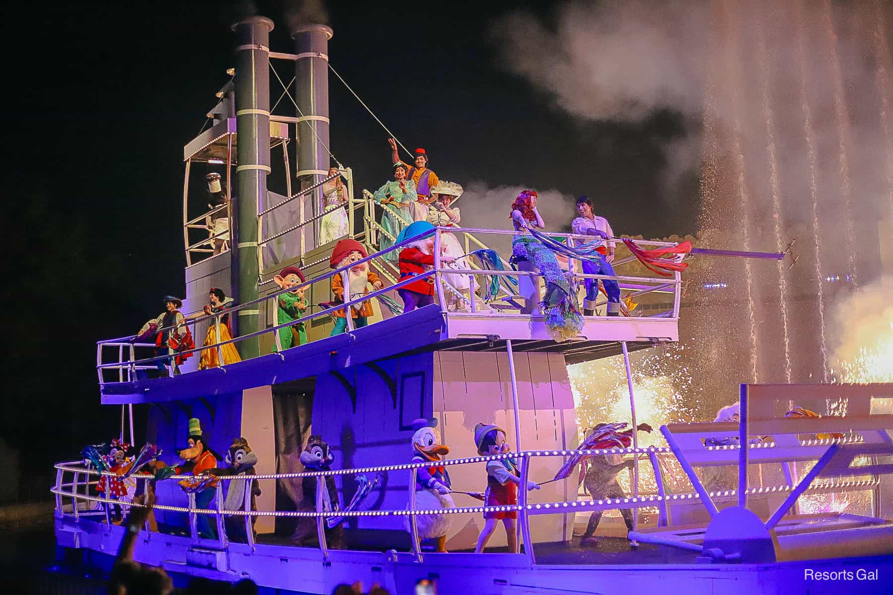 Characters on the boat during Fantasmic! 