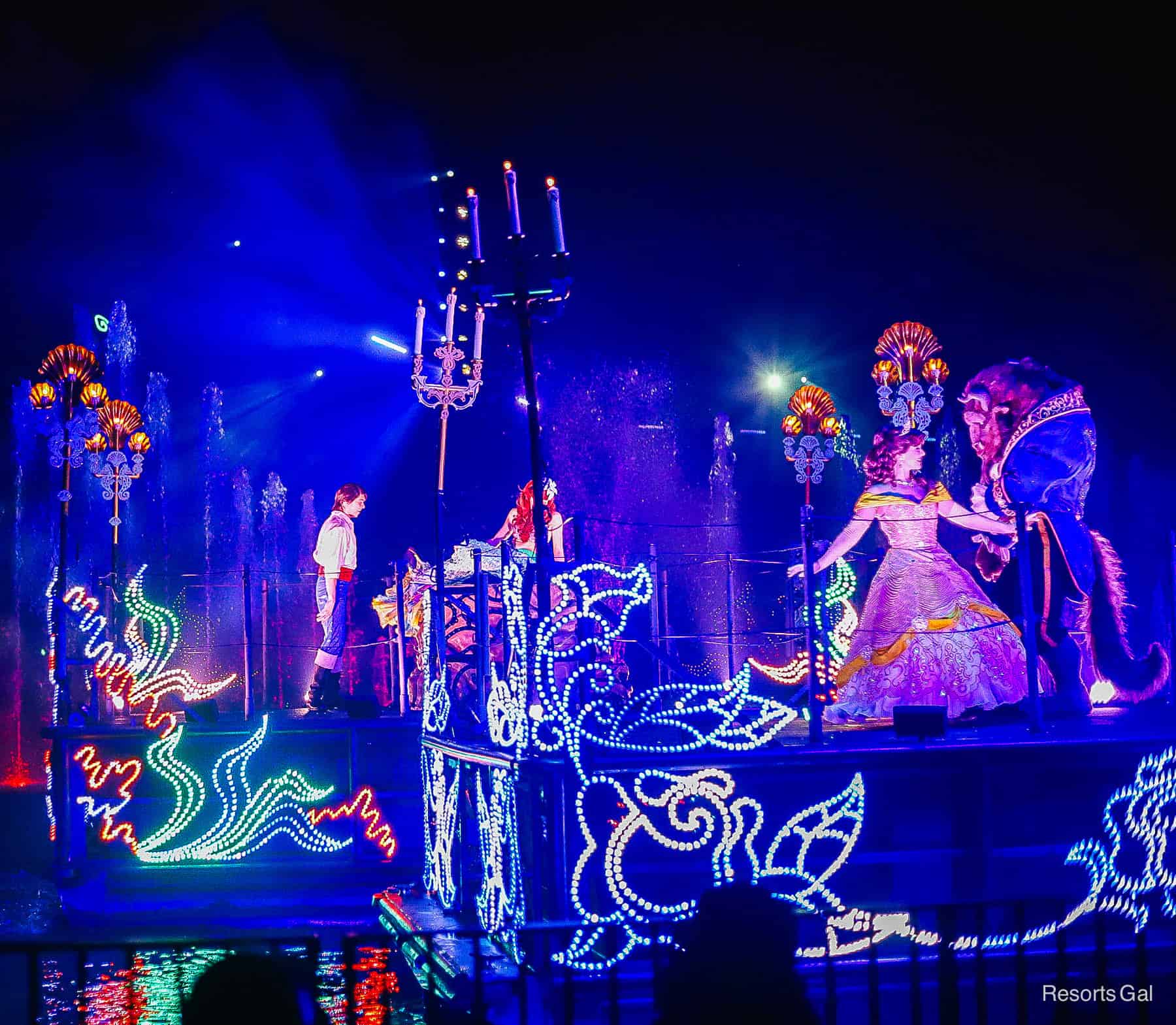 Beast with Belle and Ariel with Prince Eric on barges during Fantasmic! at Walt Disney World 