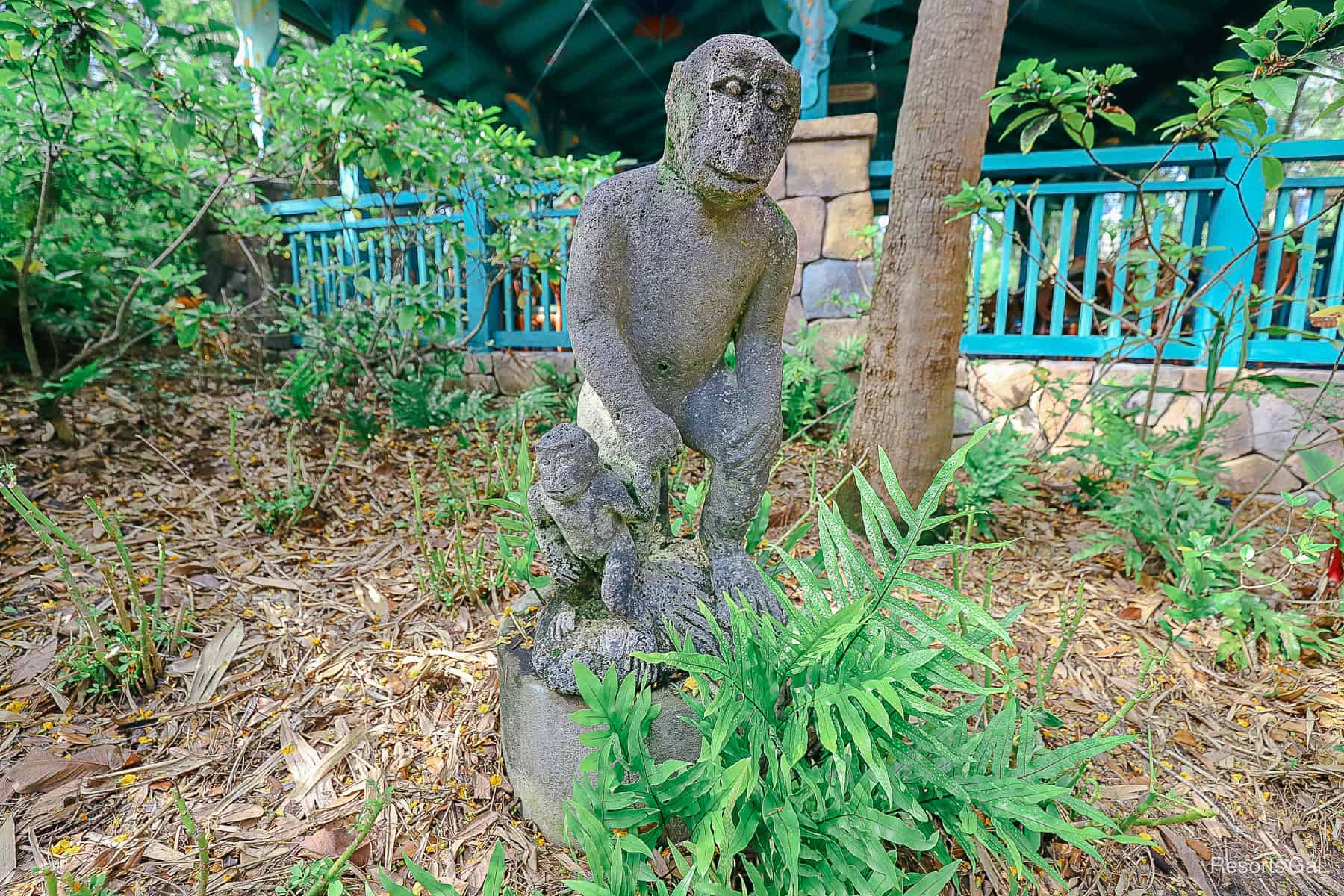 a statue in the garden dining area 