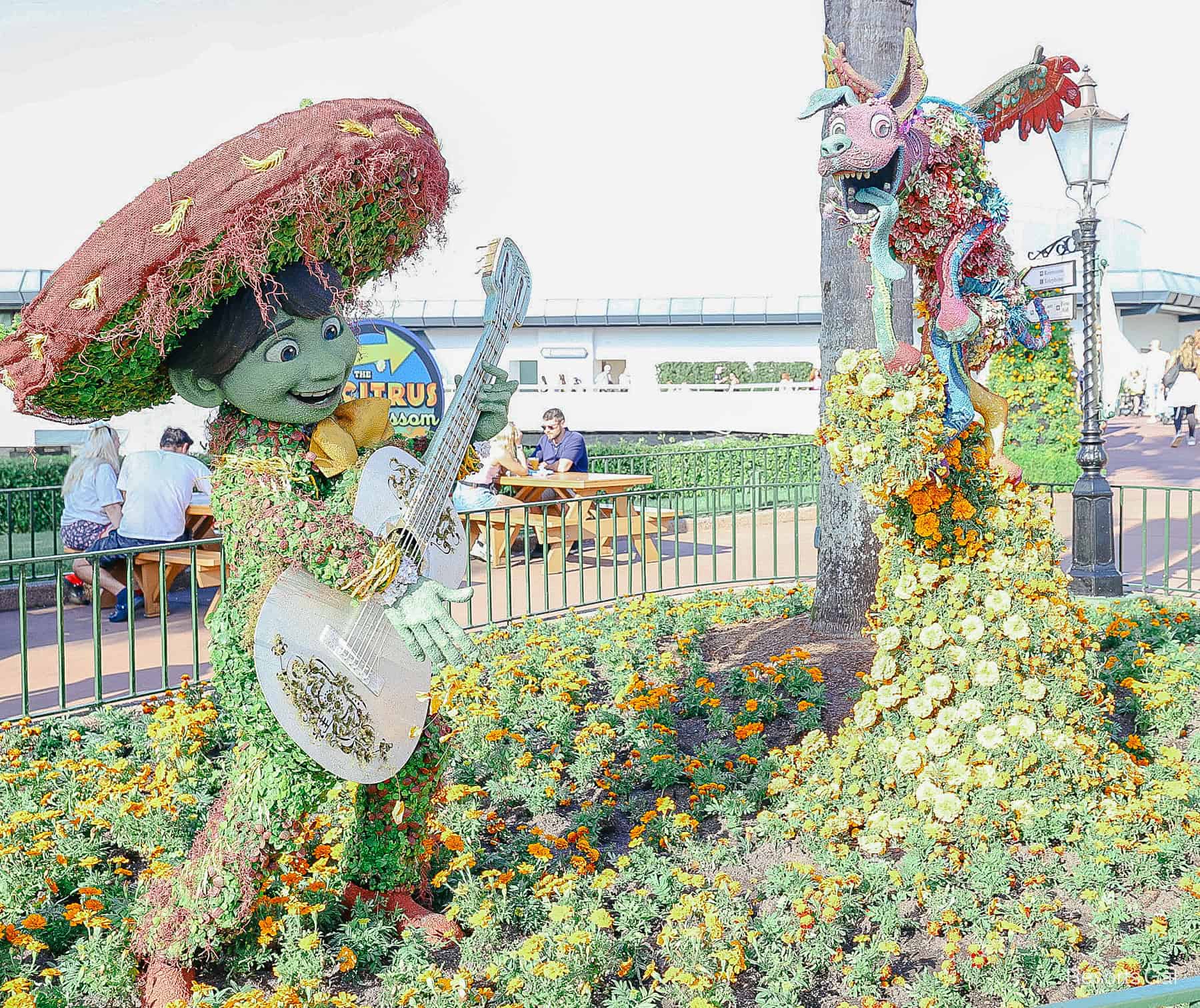 a topiary of Miguel and Dante at Epcot 