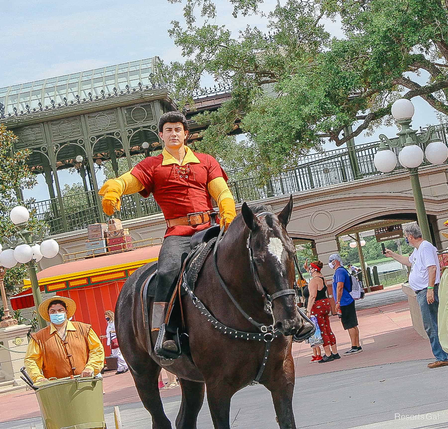 Gaston on black horse. 