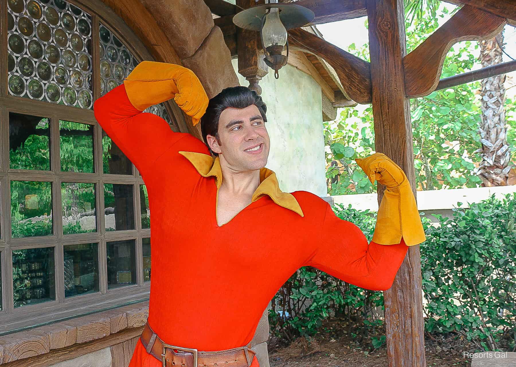 Gaston flexes his muscles at his former meet-and-greet. 