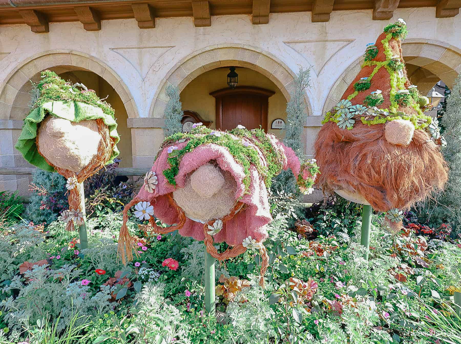 three gnomes topiary in the Germany Pavilion 