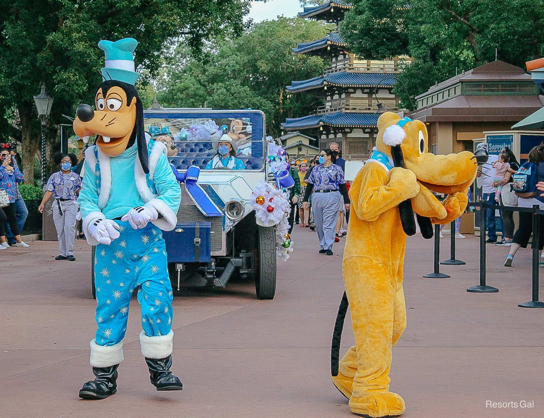 Goofy in his blue Christmas outfit during social distancing 