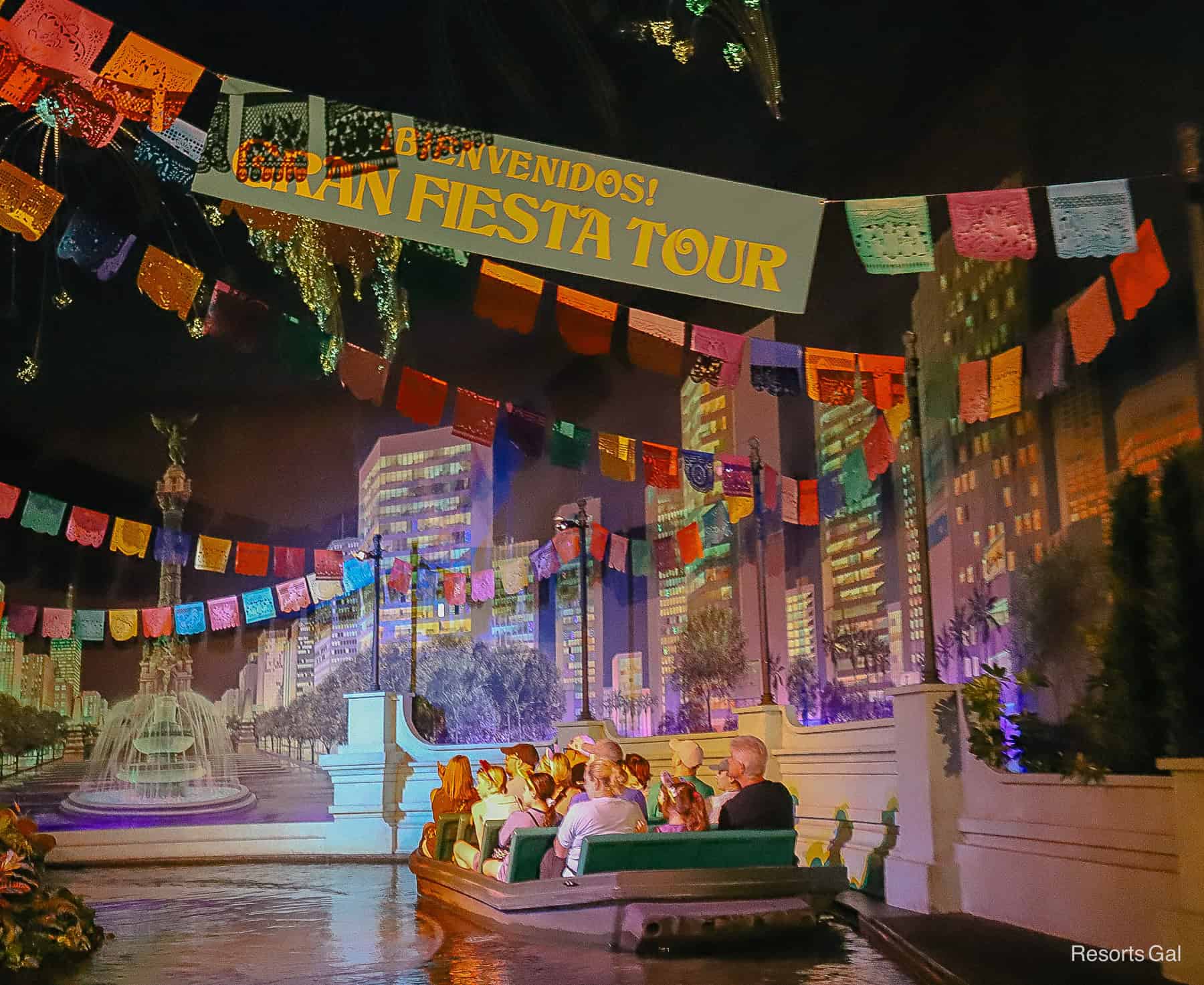 guests riding the Gran Fiesta Tour at Epcot 