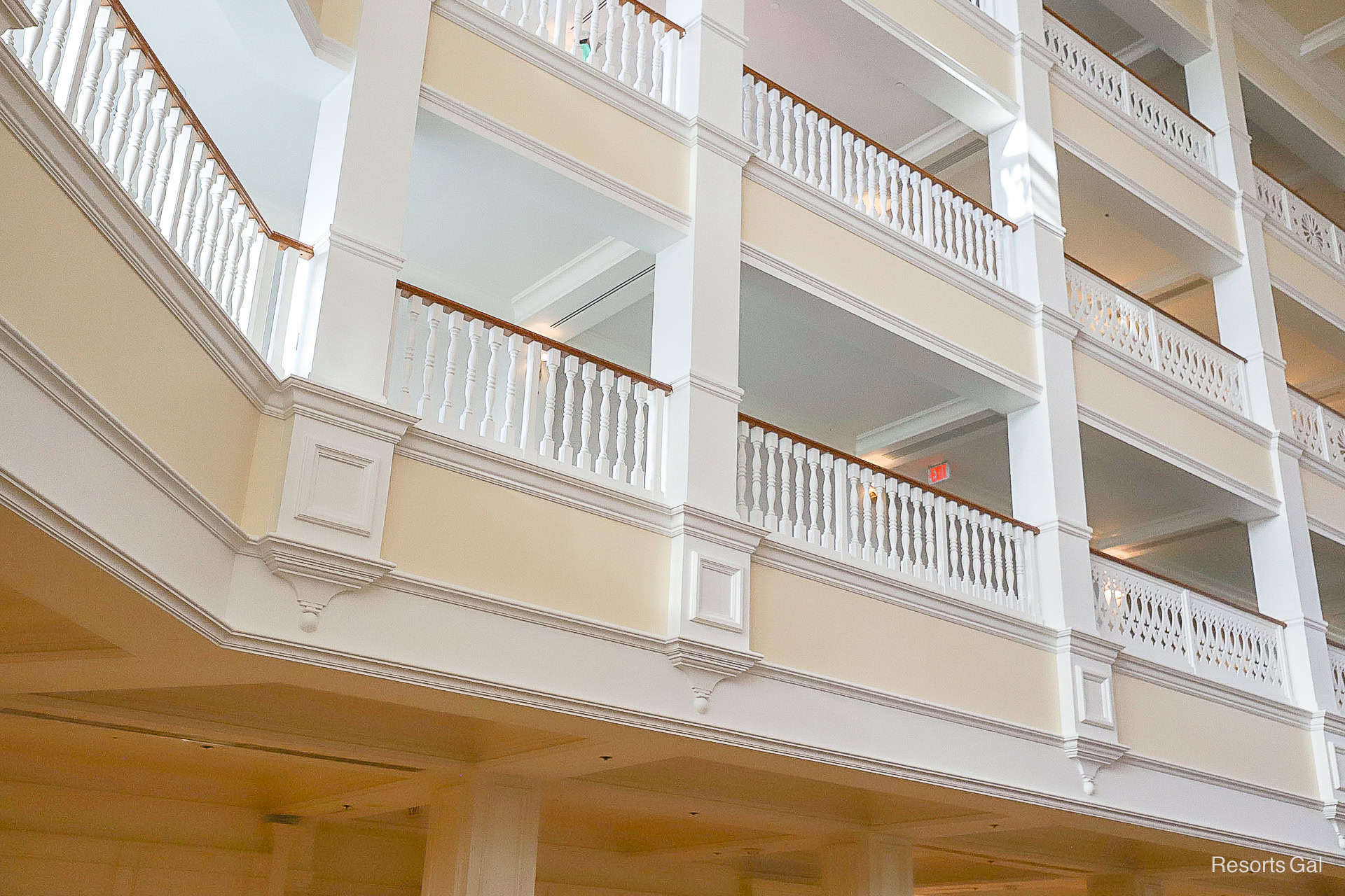 the balcony's to the lobby were painted a cream color 