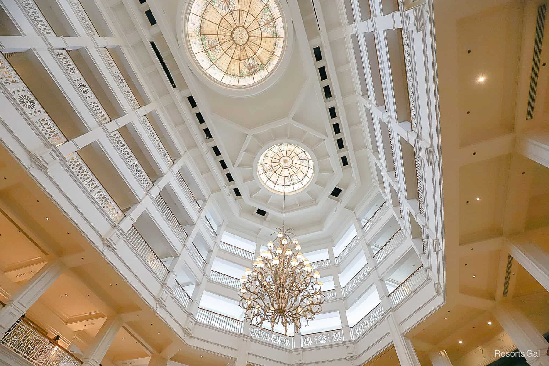 a chandelier hanging from the lobby ceiling 