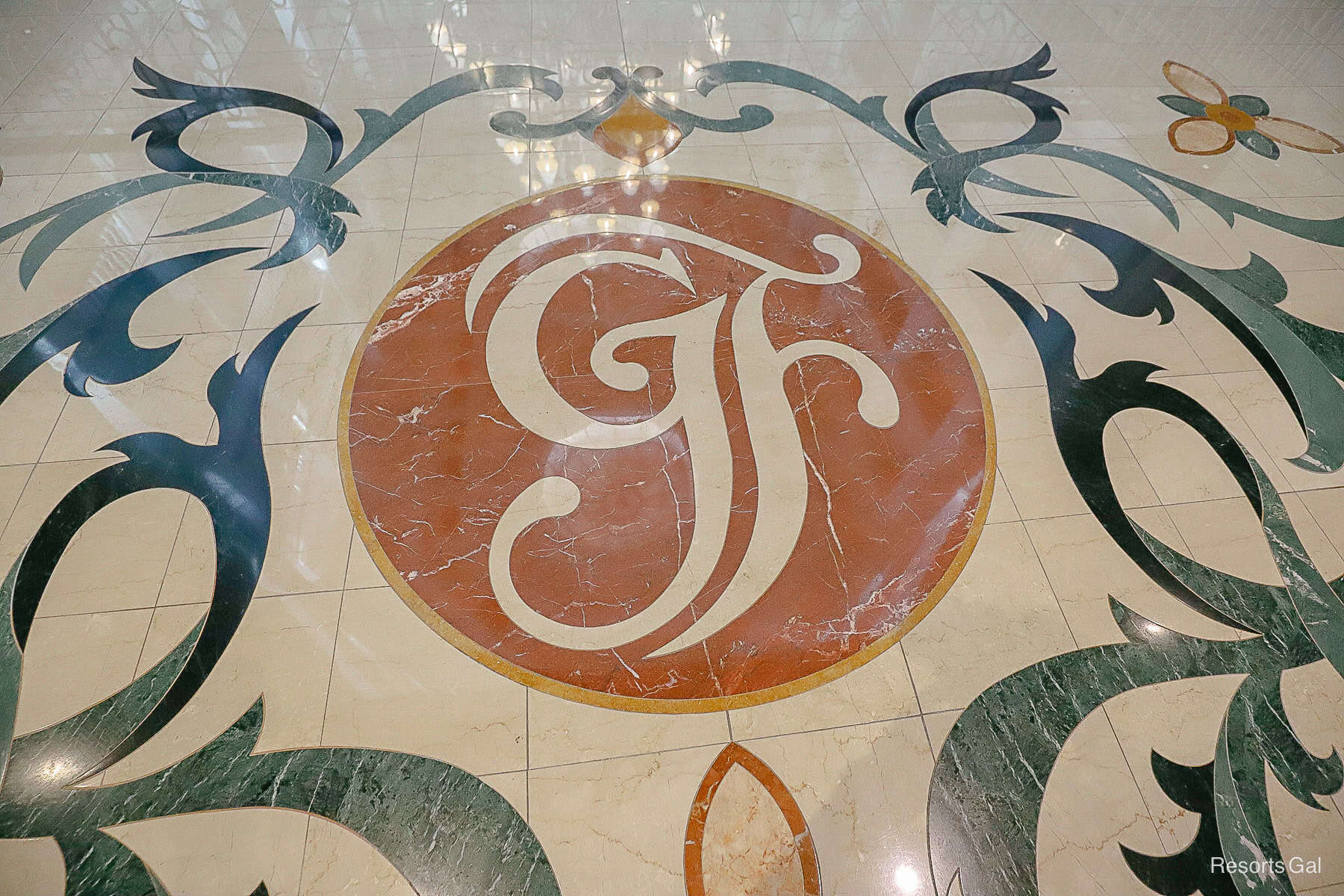 the GF logo in the marble tile at the Grand Floridian 