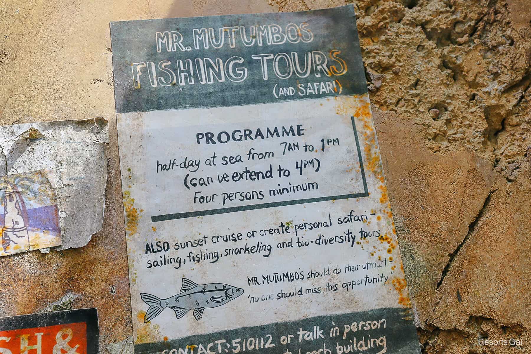 a sign that says Mr. Mutumbos Fishing Tours (and Safari)