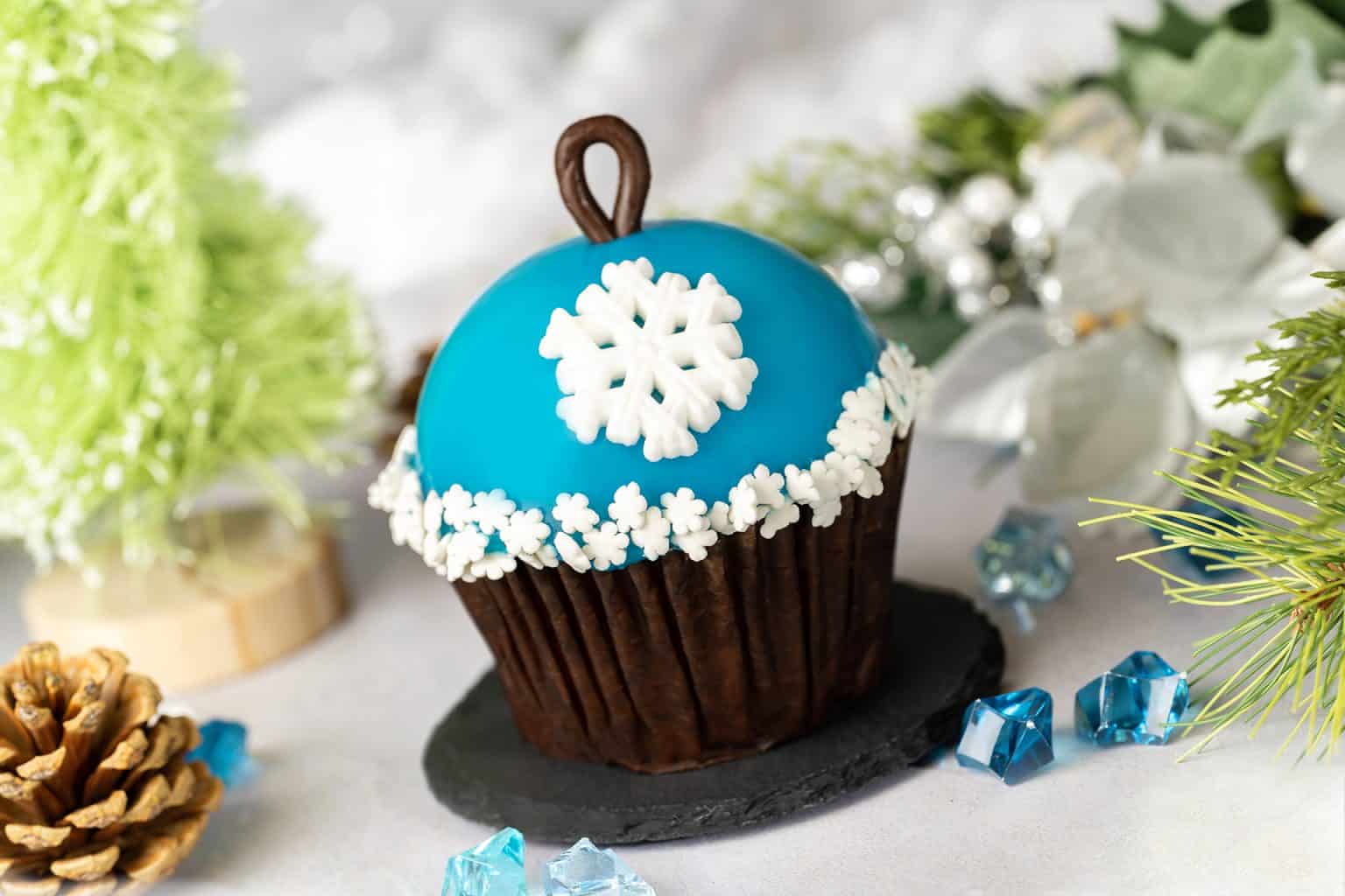 a cupcake at a Disney Resort that looks like a snowflake ornament 