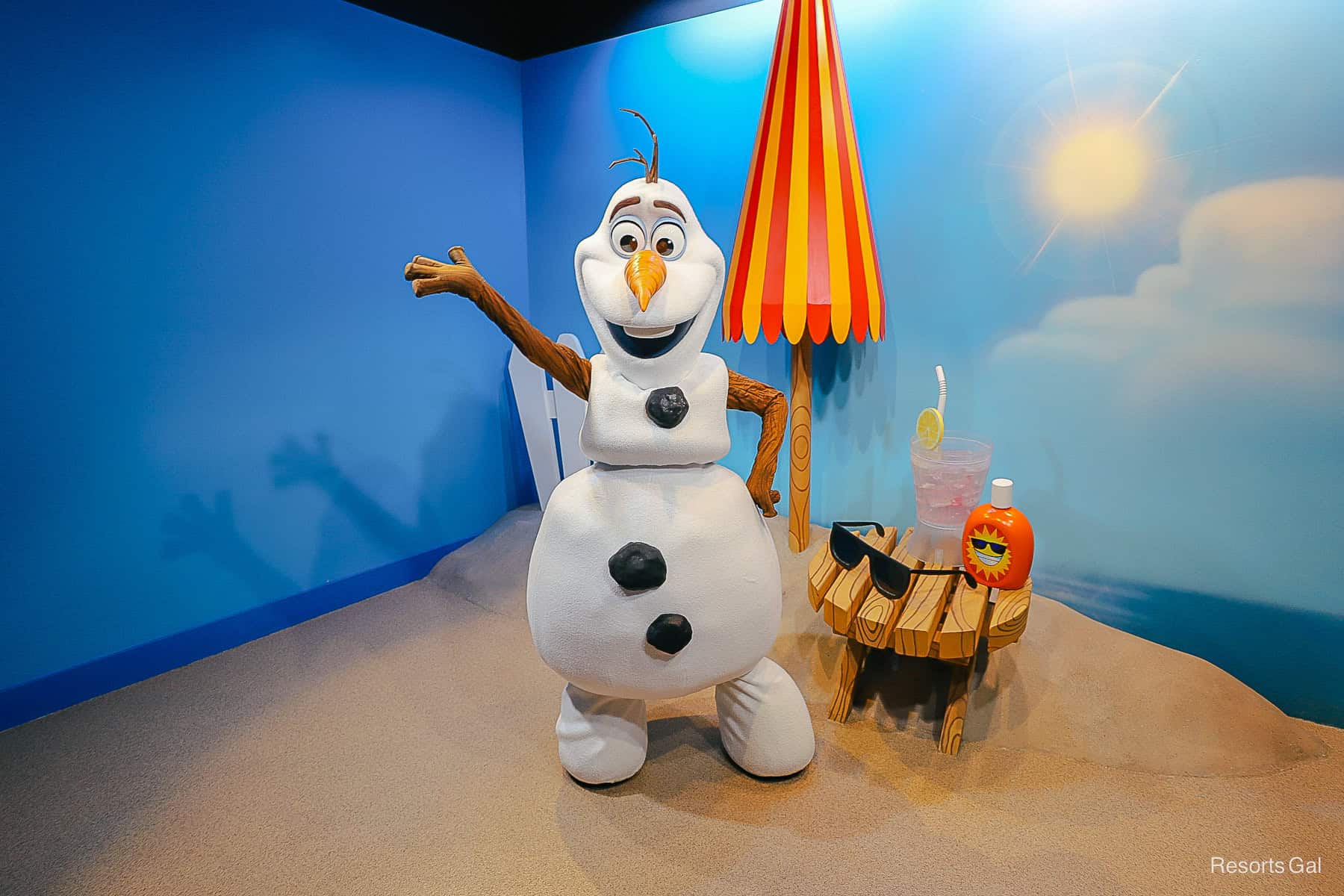 Olaf poses on a beach scene at the Celebrity Spotlight attraction at Disney's Hollywood Studios 