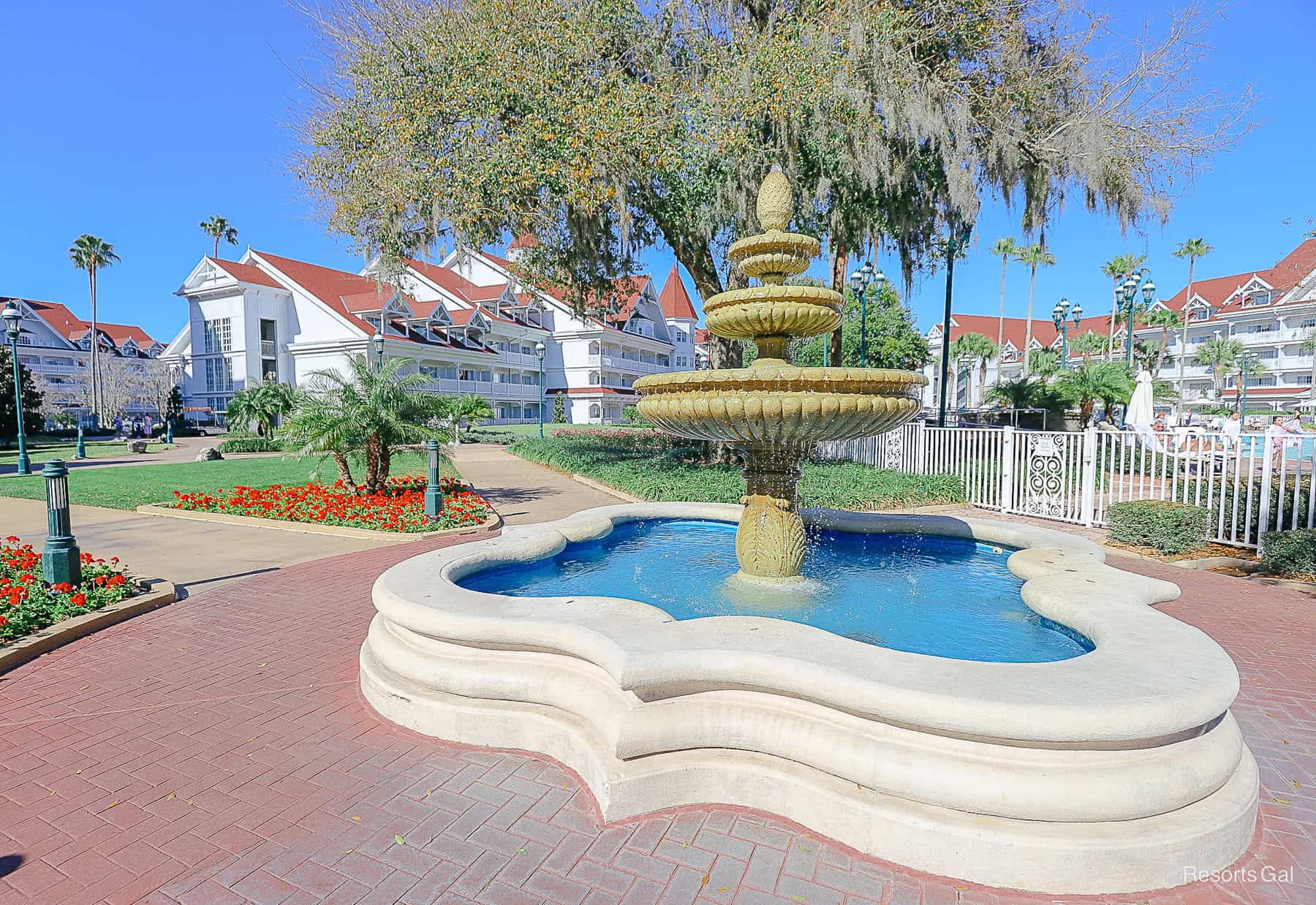 a fountain in front of the Courtyard Pool at the Grand Floridian