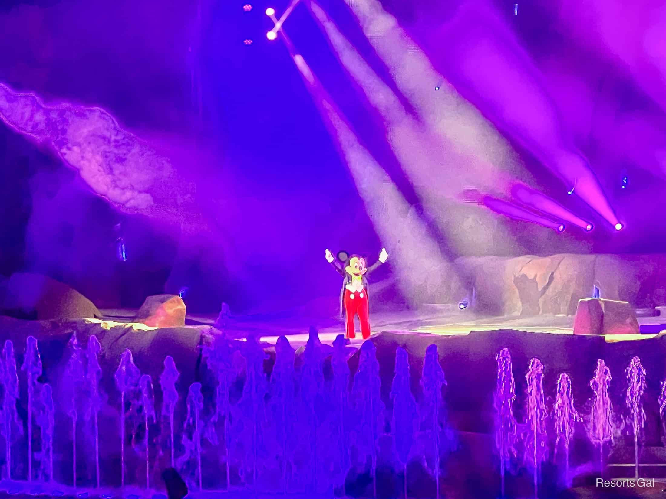 Mickey Mouse in suit and tie during Fantasmic! 