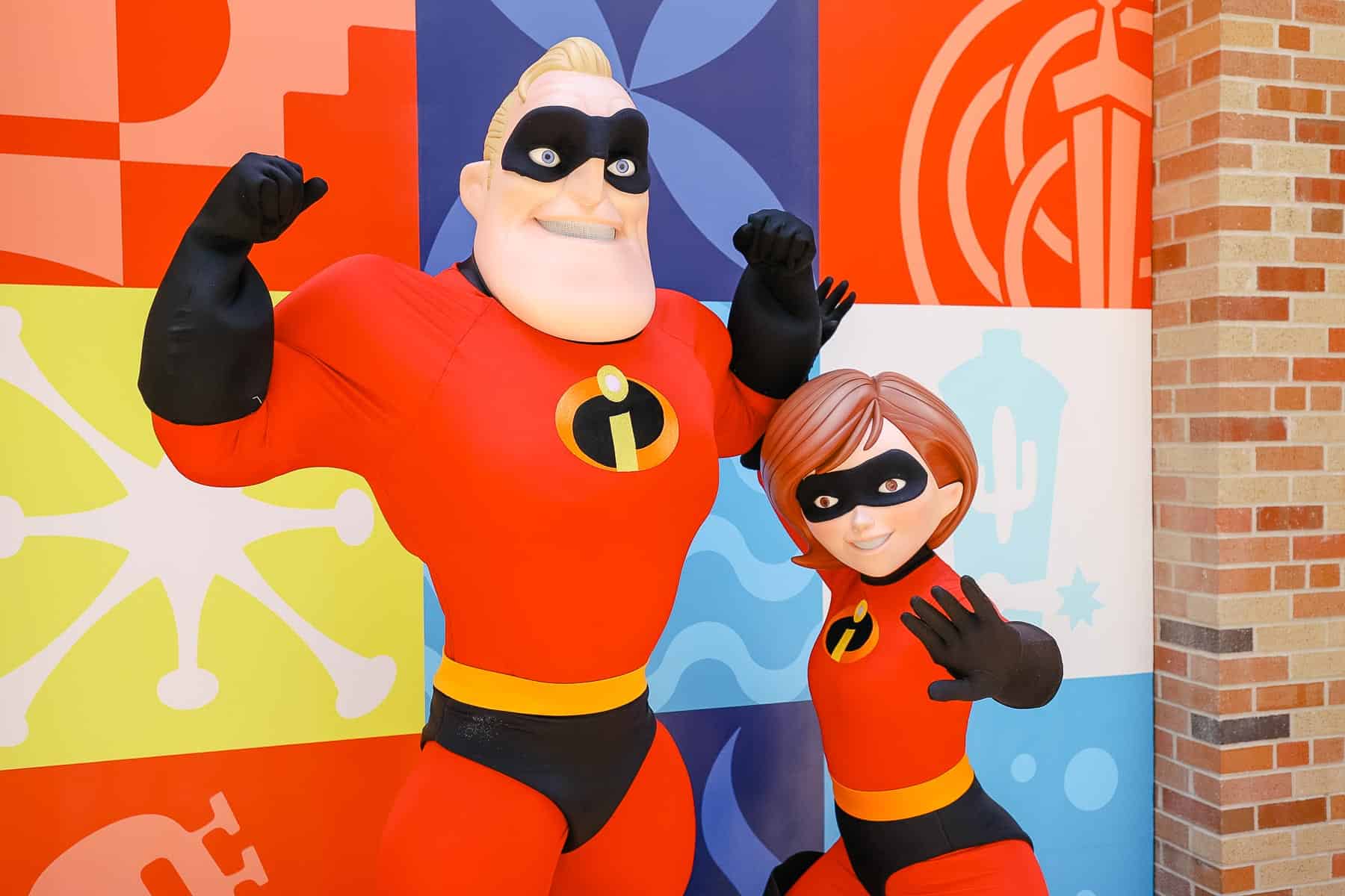 Mr. and Mrs. Incredible with a super hero pose 