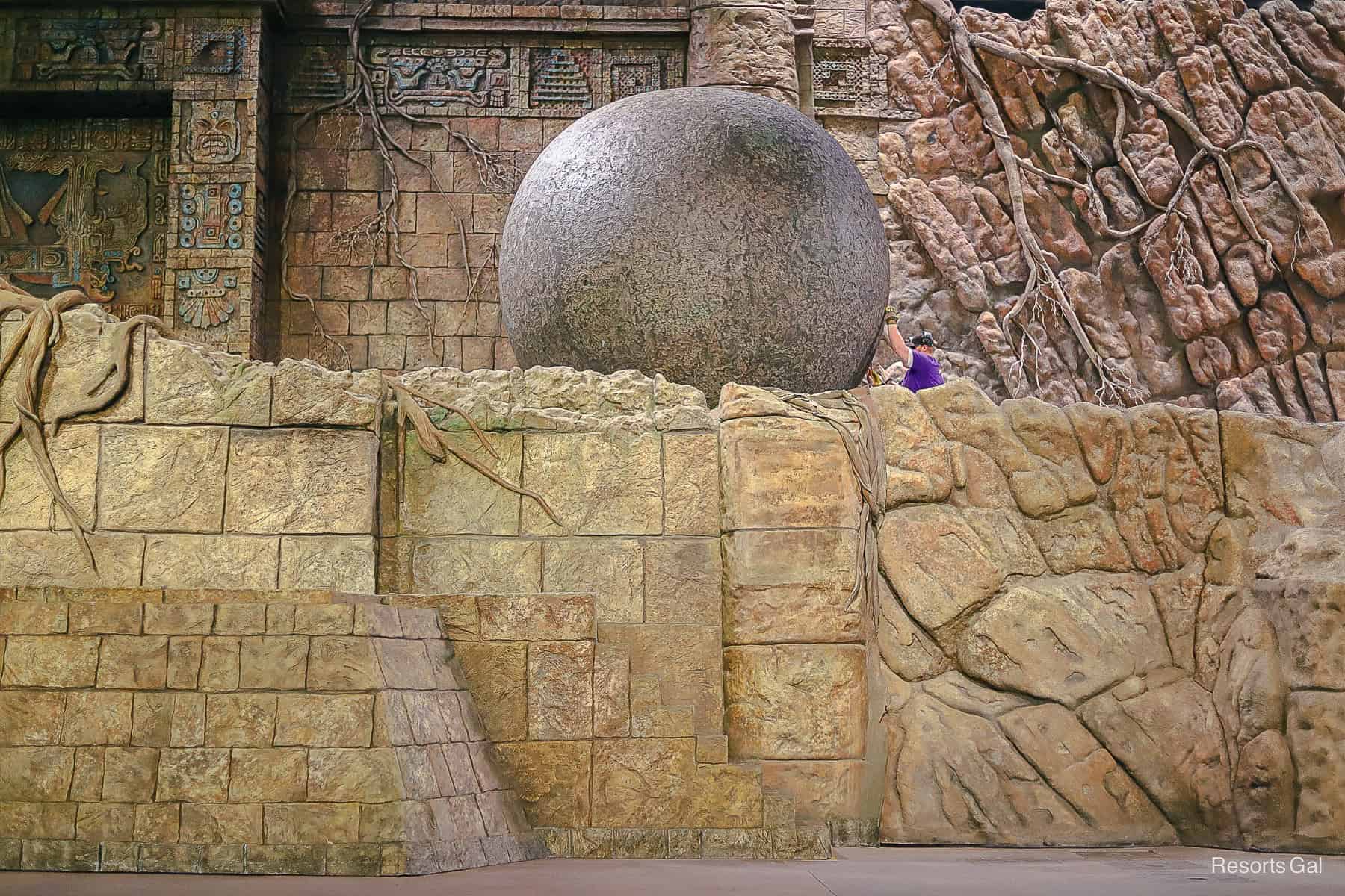 crew rolling the giant boulder back into place after the first scene of Indiana Jones Epic Stunt Spectacular 