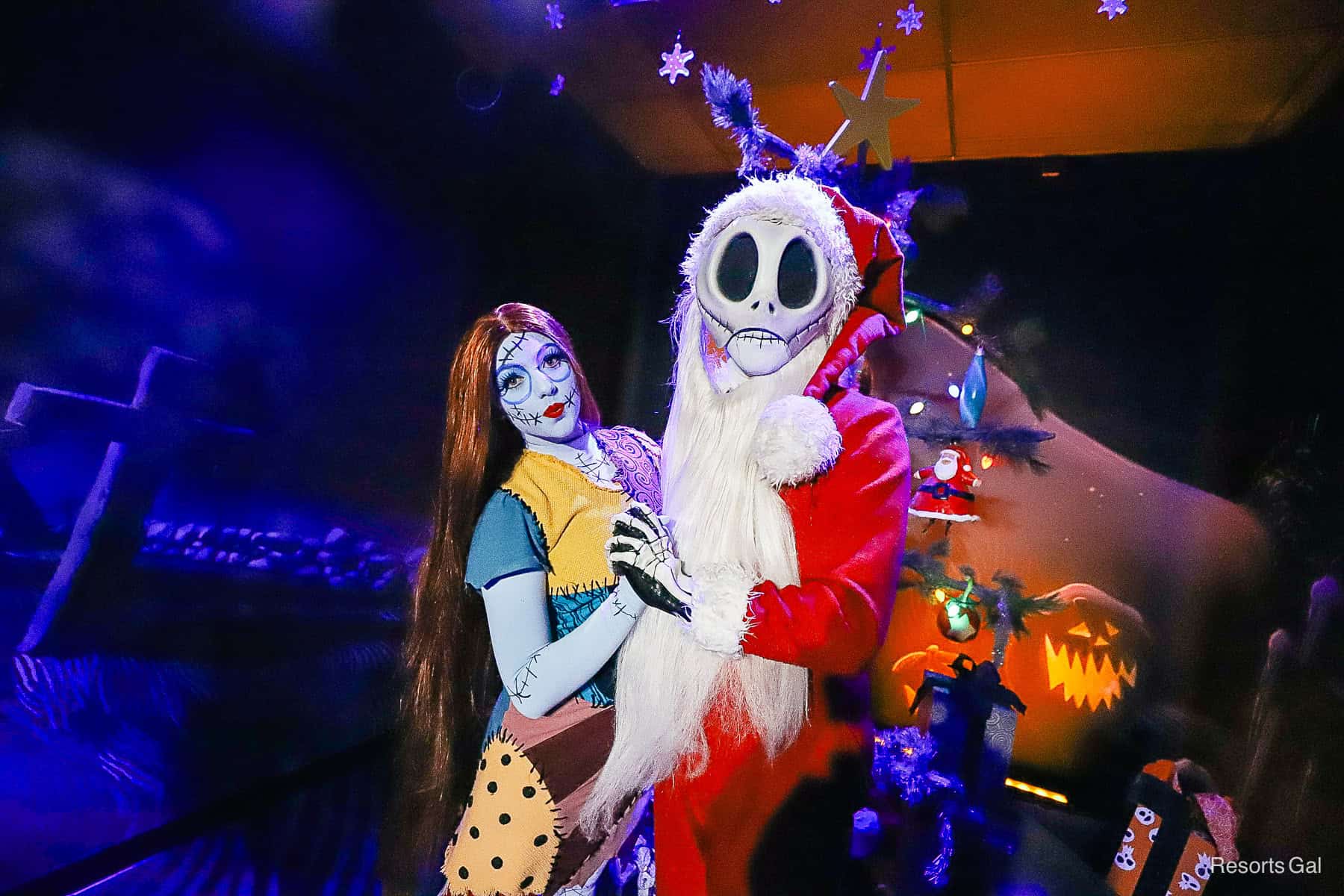 Jack Skellington poses as Sandy Claws with Sally 