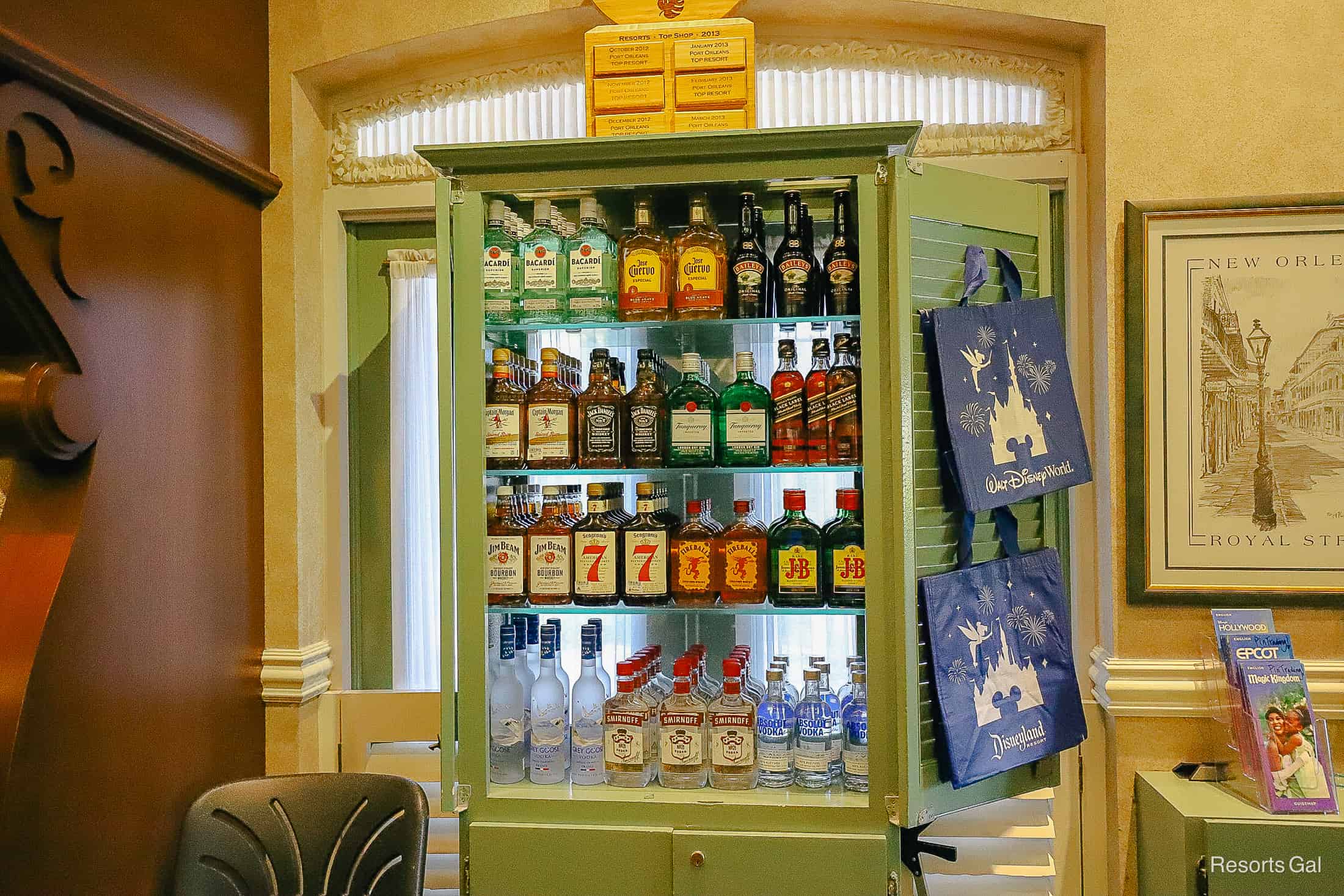 liquor cabinet behind the register in Jackson Square Gifts and Desires 