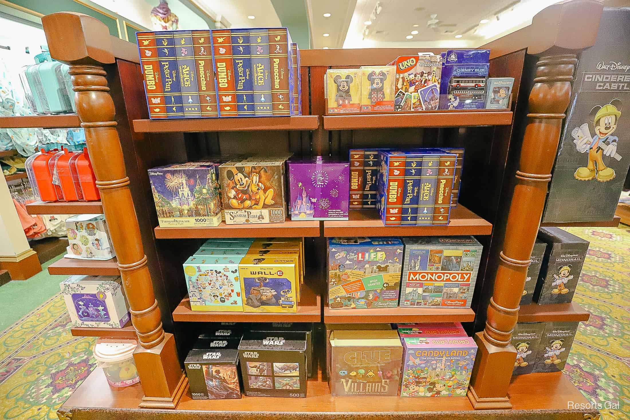 a display with board games, cards, and puzzles