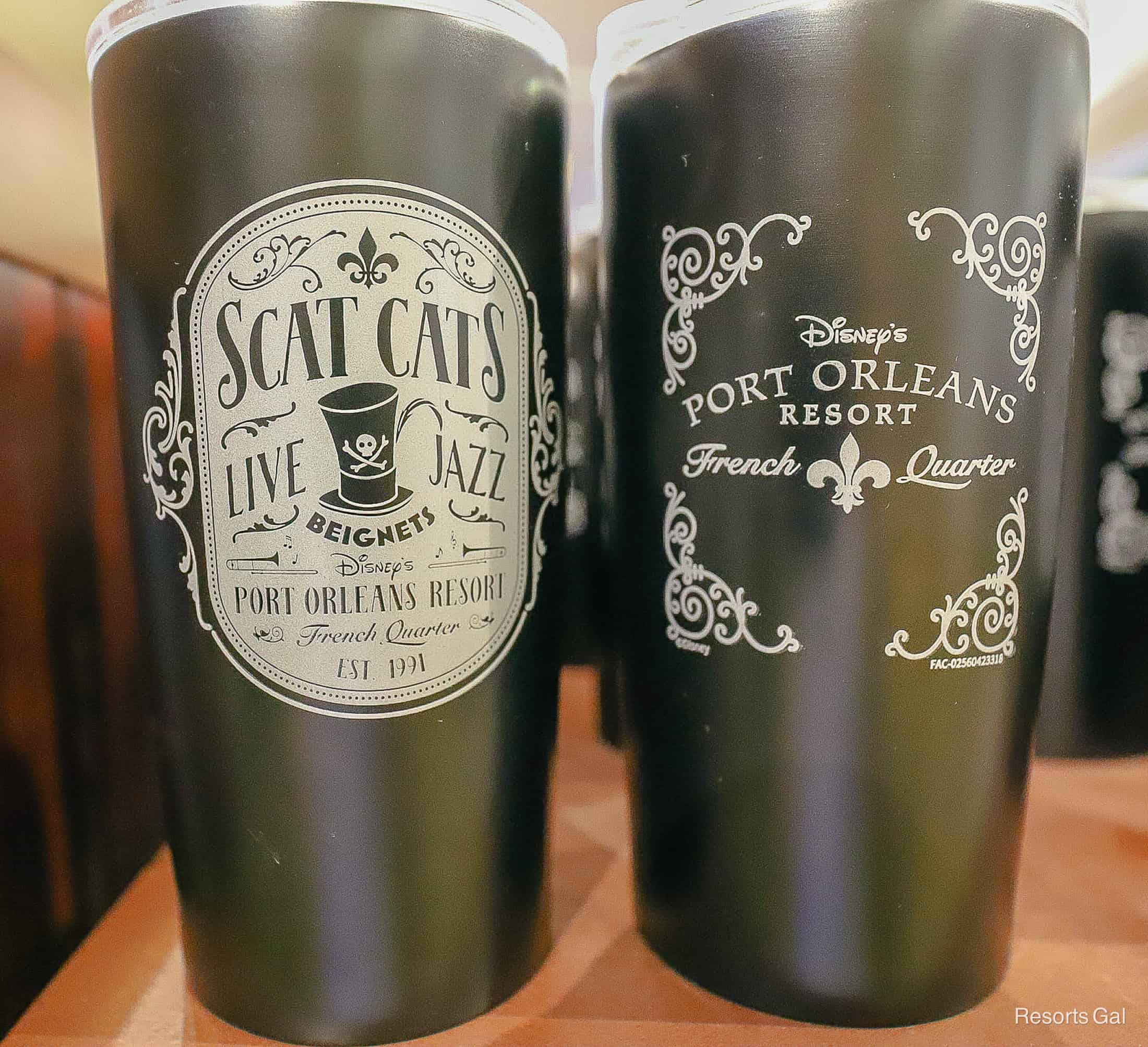 a black tumbler that says Scat Cat's Live Jazz and Disney's Port Orleans French Quarter 