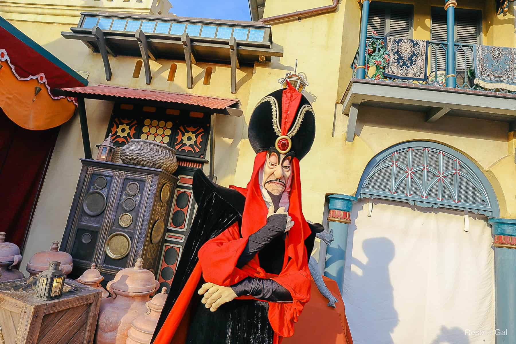 Jafar poses for a photo in his red and black outfit 