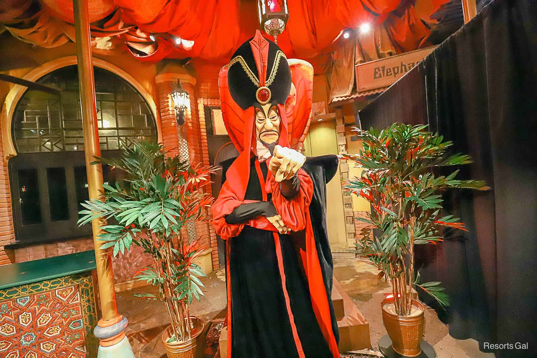 Jafar points to the camera. 