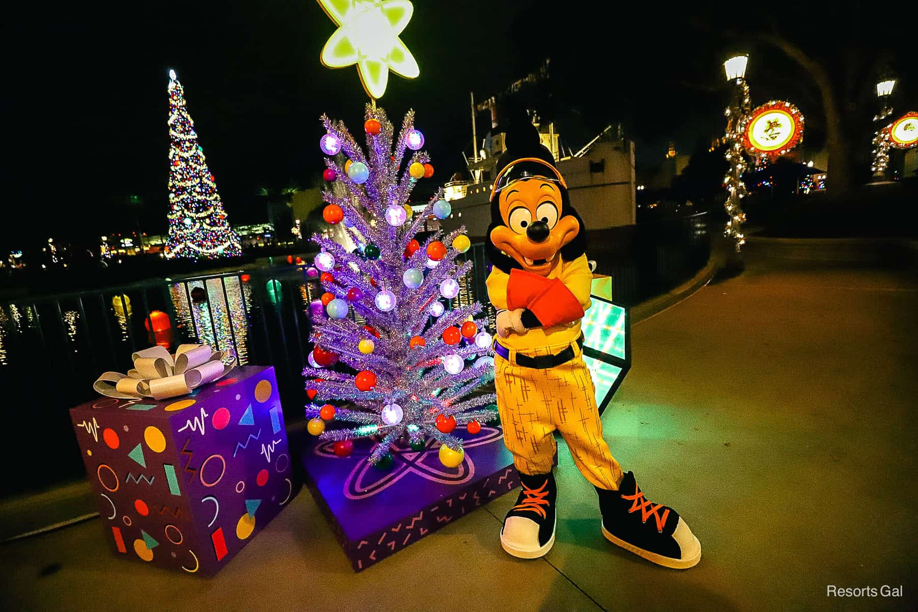 Powerline Max Goof with a tinsel tree at Jollywood Nights