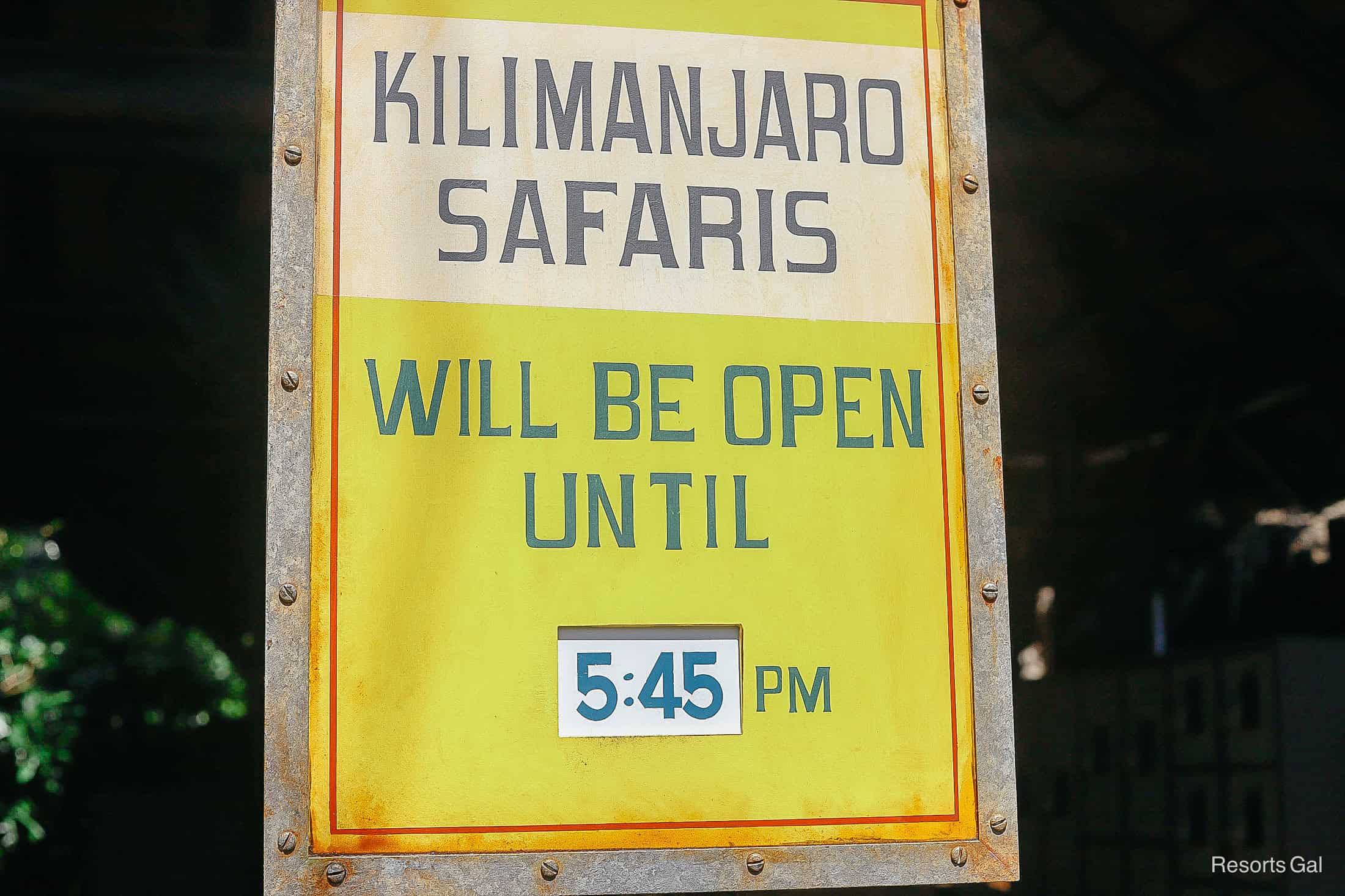 a sign that tells how long Kilimanjaros is open for the day 