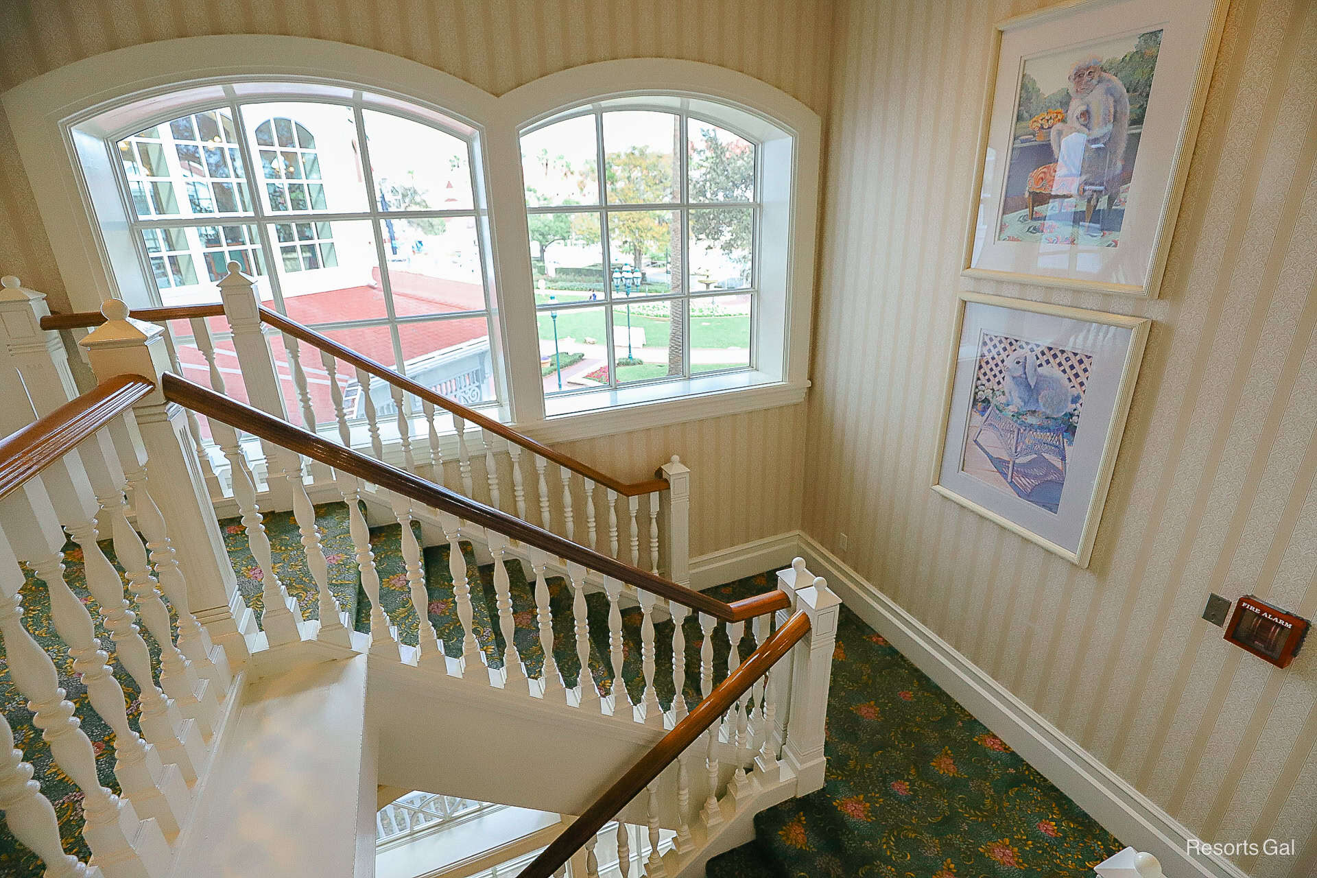 a staircase with a monkey and rabbit painting