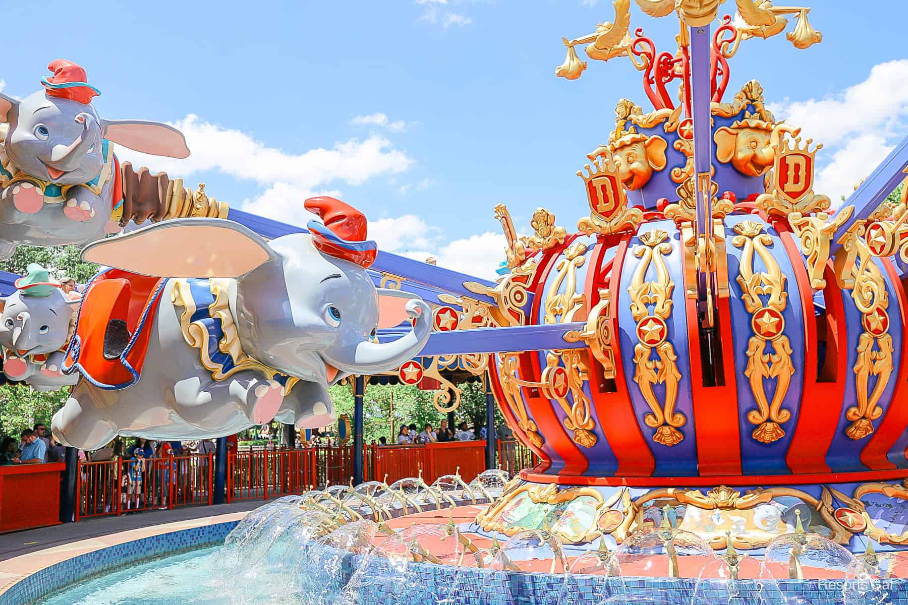 guests riding the Dumbo spinner attraction at Magic Kingdom 