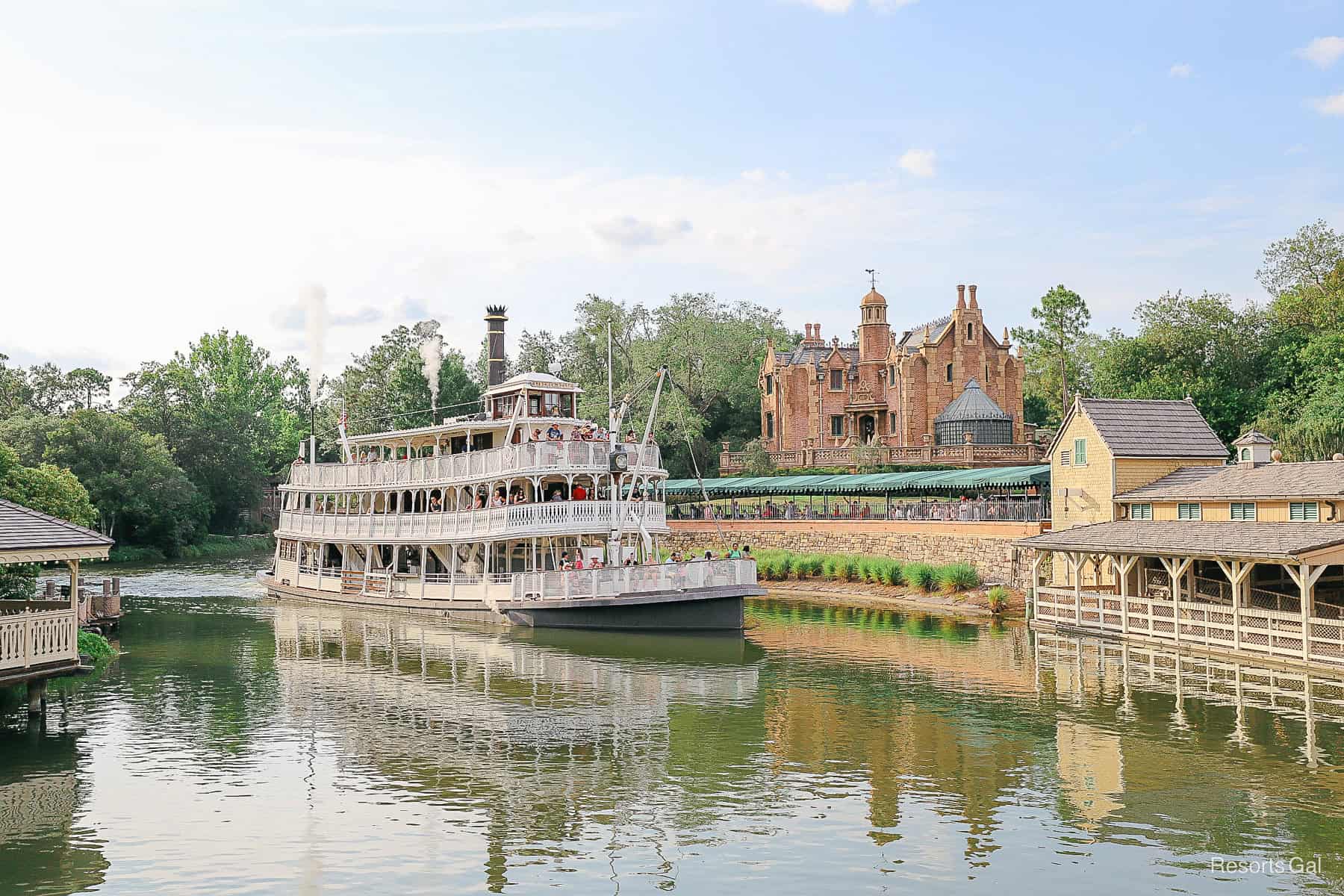 the Liberty Square Riverboat approaching the dock on the Rivers of America 