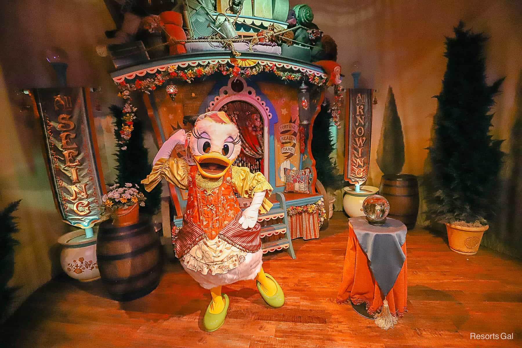 Daisy Duck poses as a fortune teller at Pete's Silly Sideshow at Magic Kingdom. 