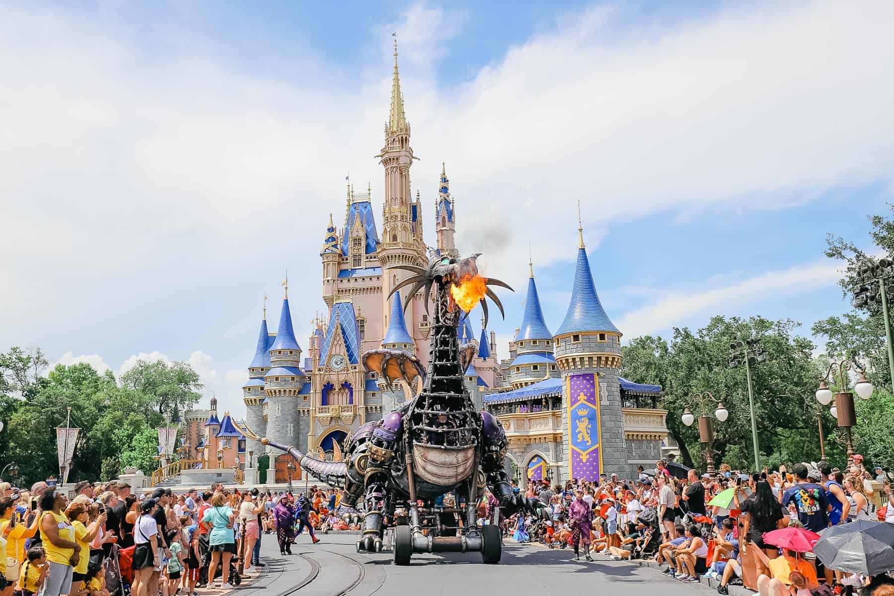 the Festival of Fantasy Parade at Magic Kingdom with Maleficent's dragon 