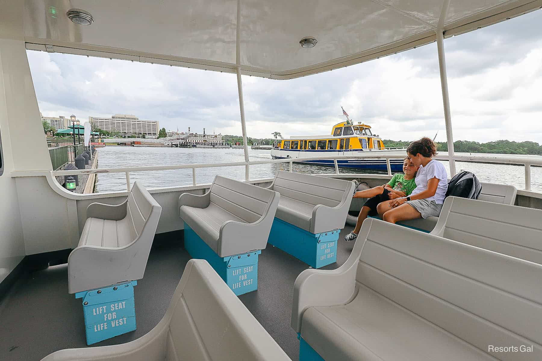 rows of seats on the back of one of the larger Magic Kingdom Resort Boats 