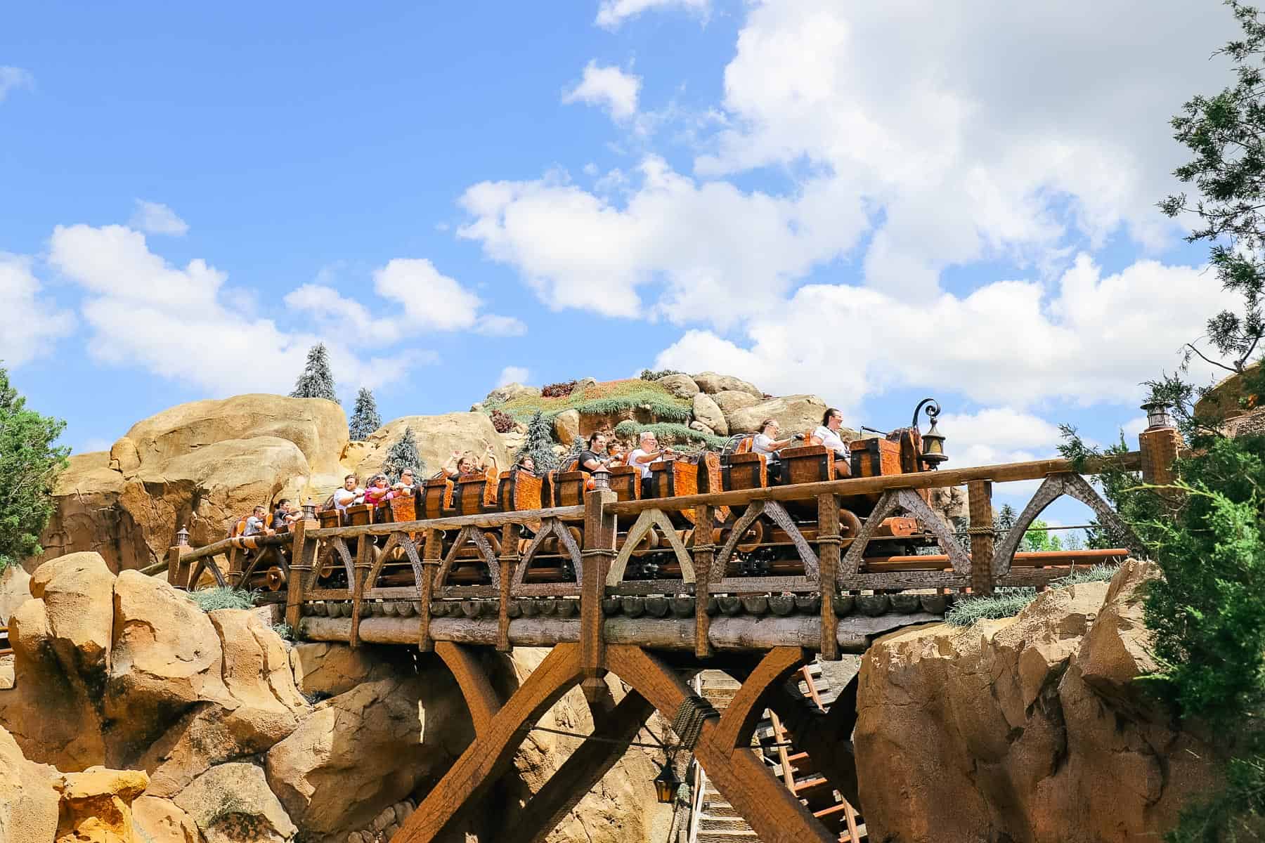 guests riding the Mine Train 