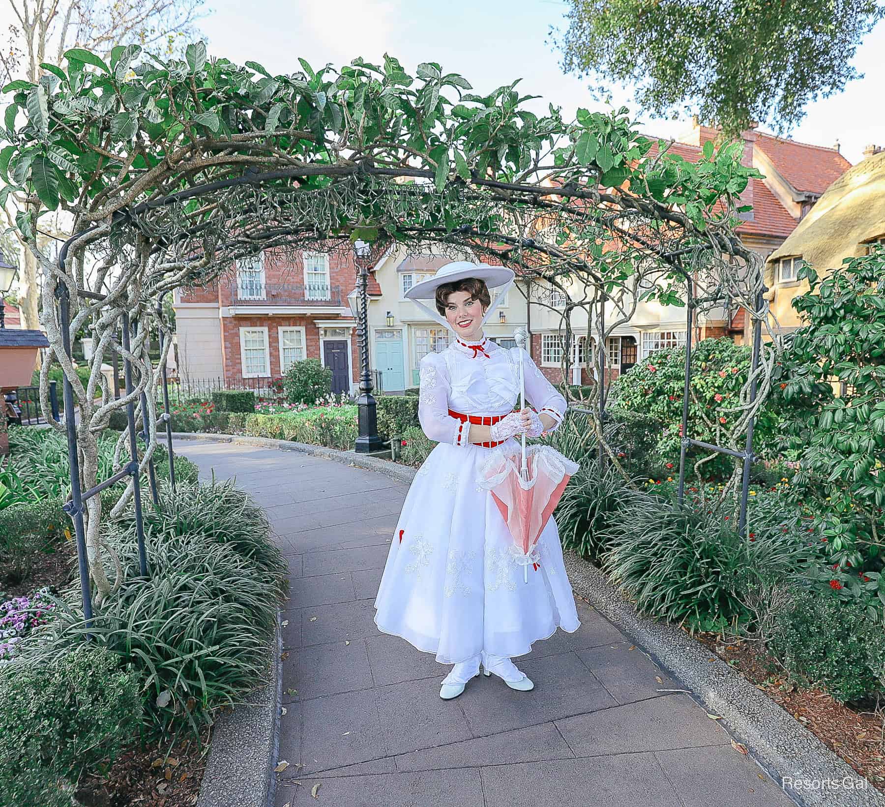 Mary Poppins in her white jolly holiday dress with red trim. 