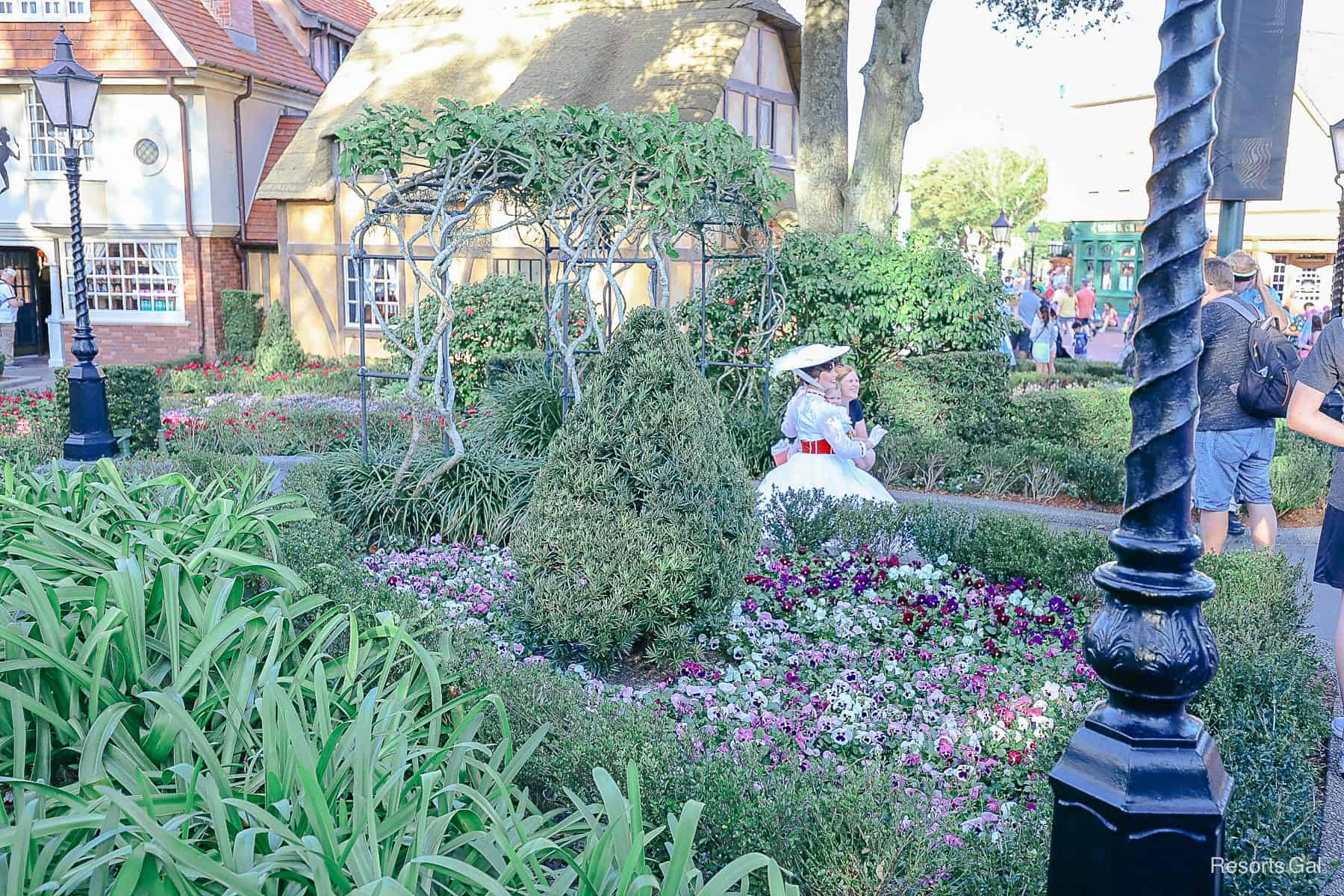 Mary Poppins meets with guests at Epcot. 