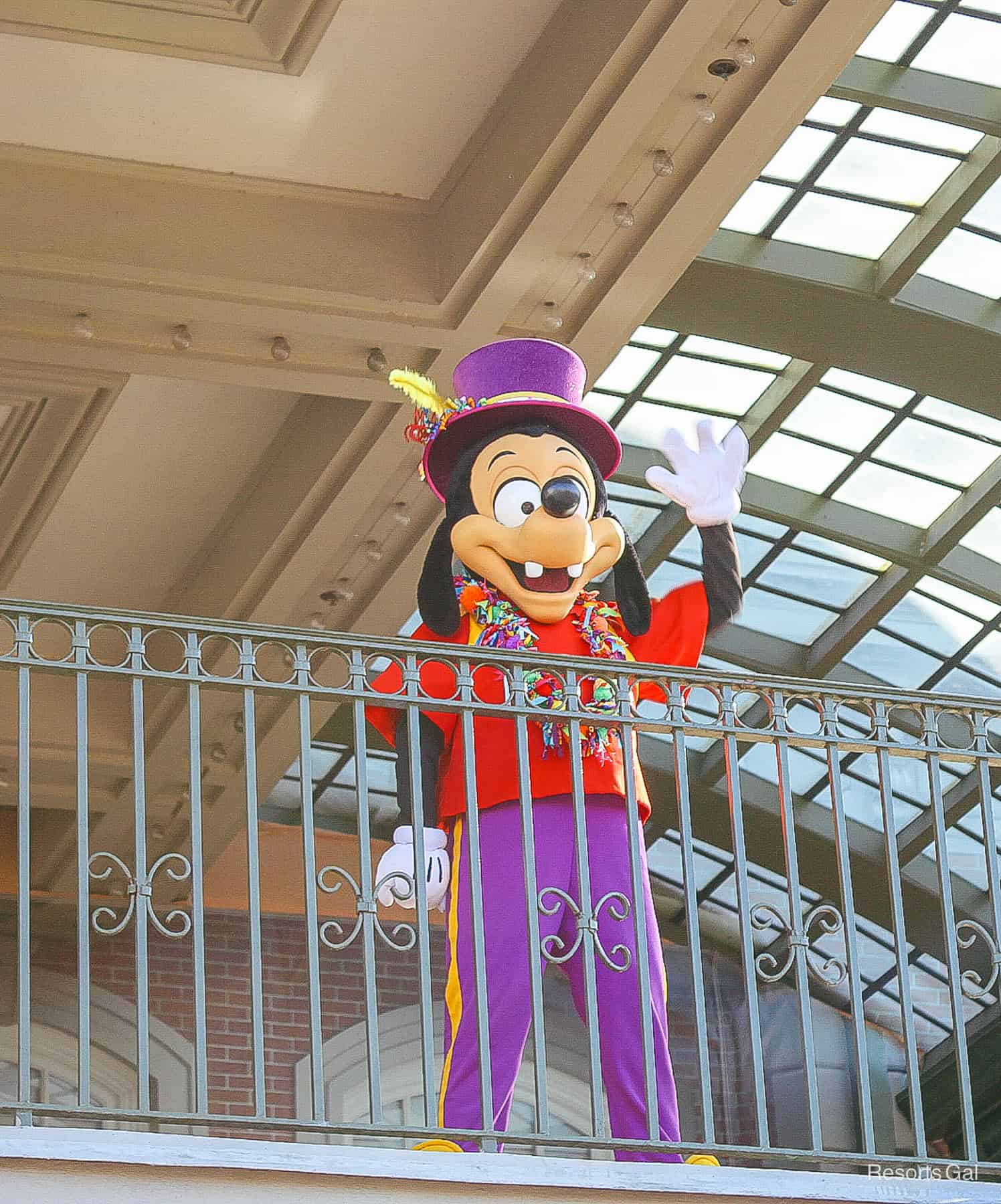 Max Goof waves from Main Street balcony. 