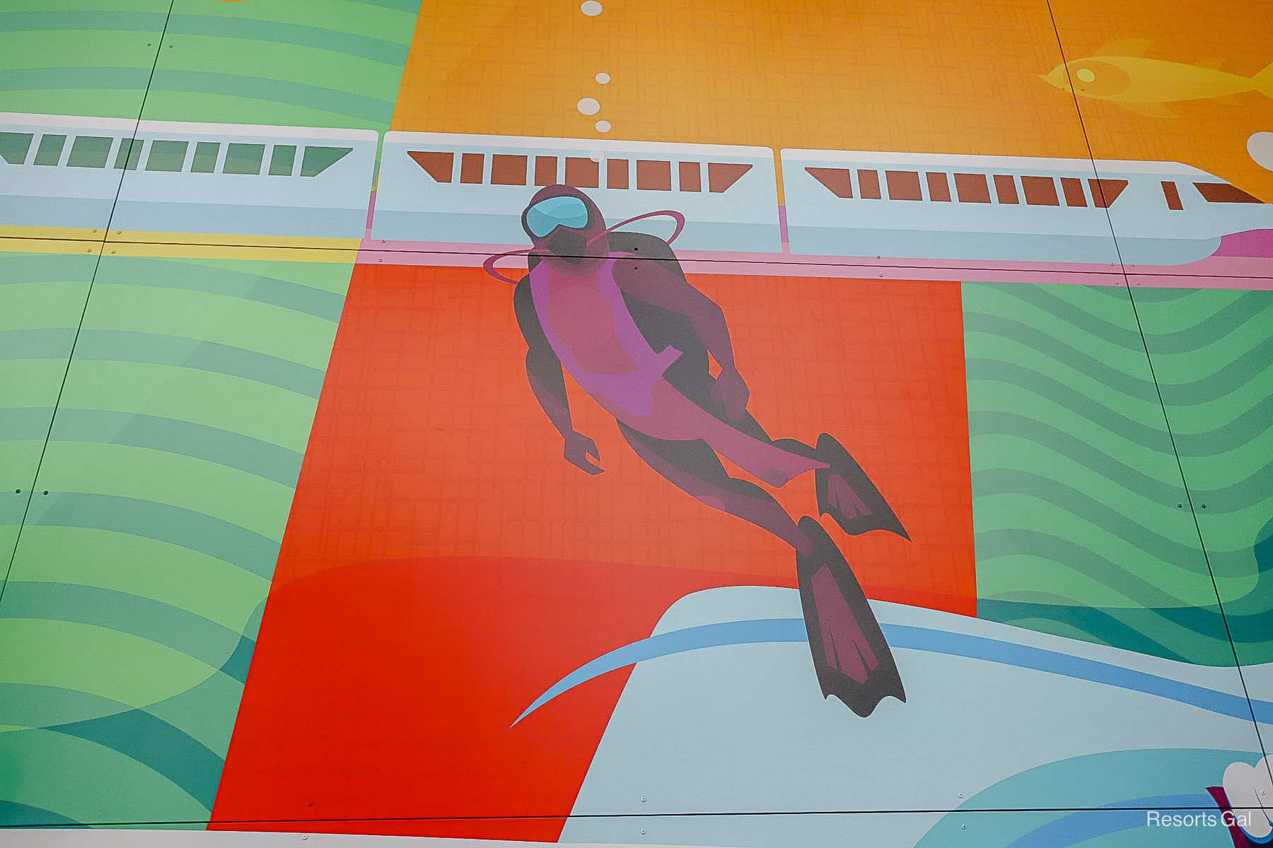 a diver mural as reference to the Living Seas 