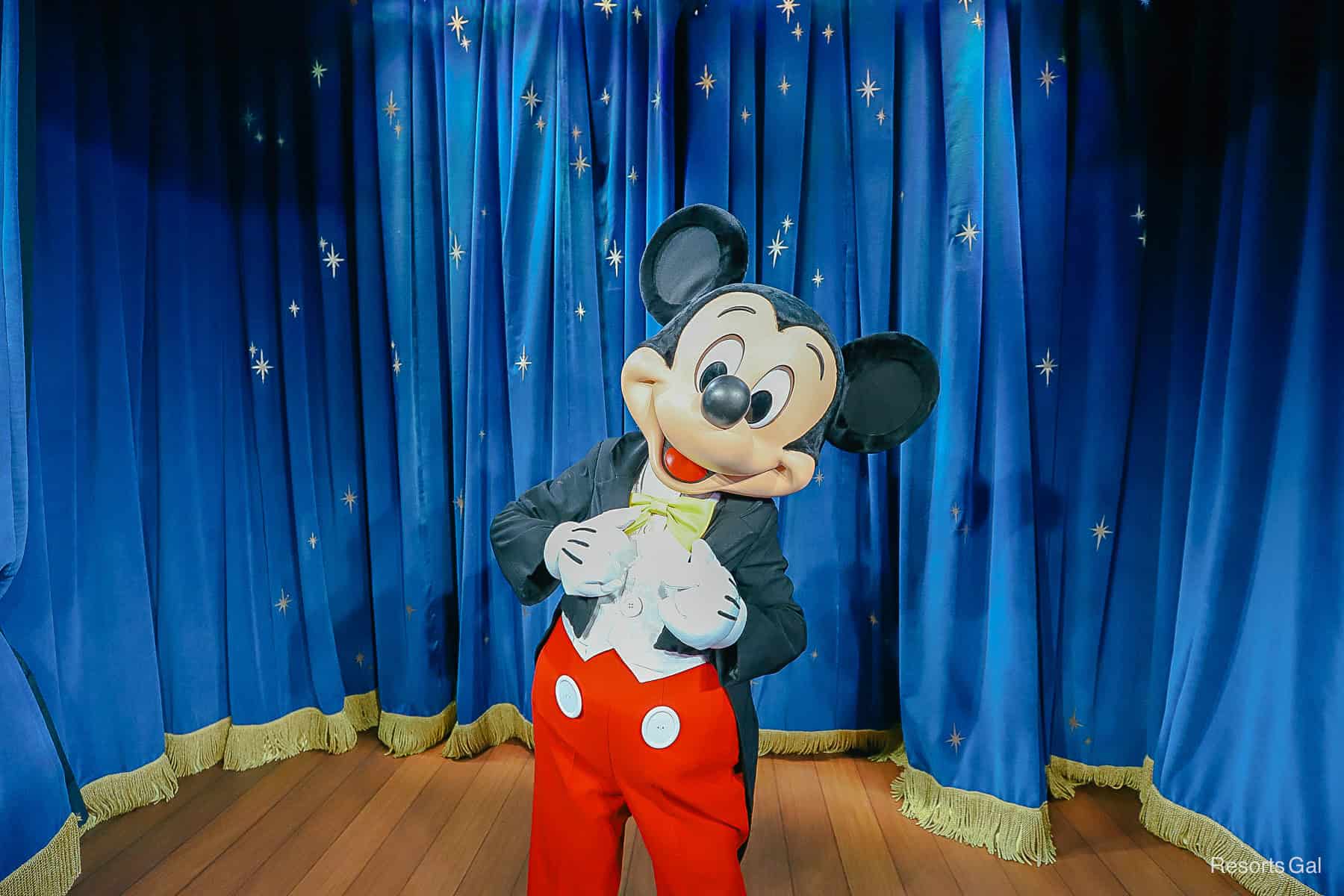 Mickey Mouse poses for a photo at the Magic Eye Theater at Epcot.