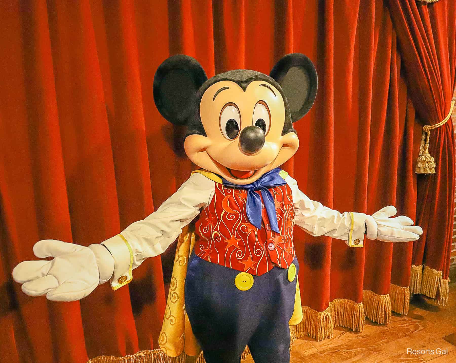 Mickey with both arms extended. 