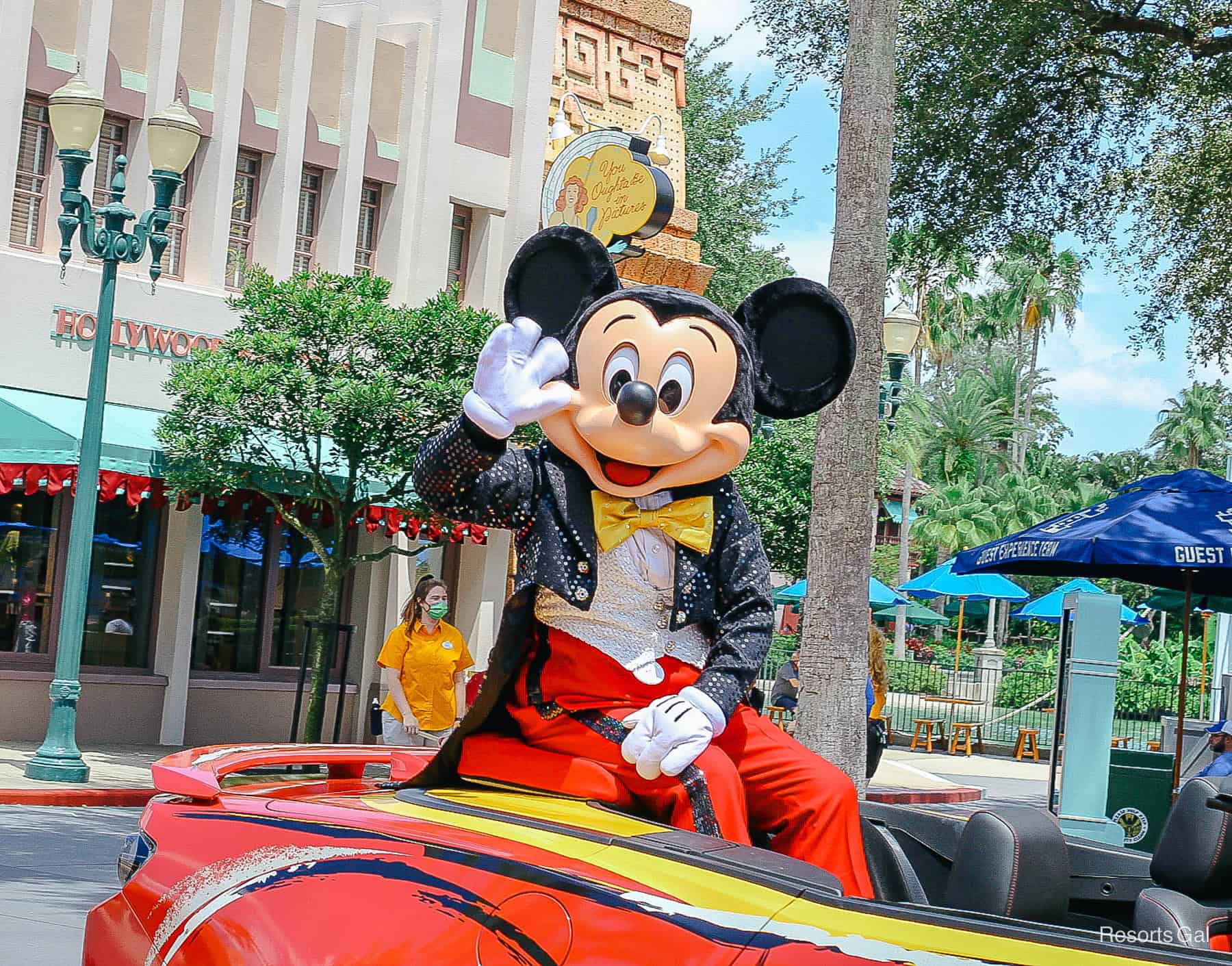 Mickey waves from a Hollywood Studios motorcade 