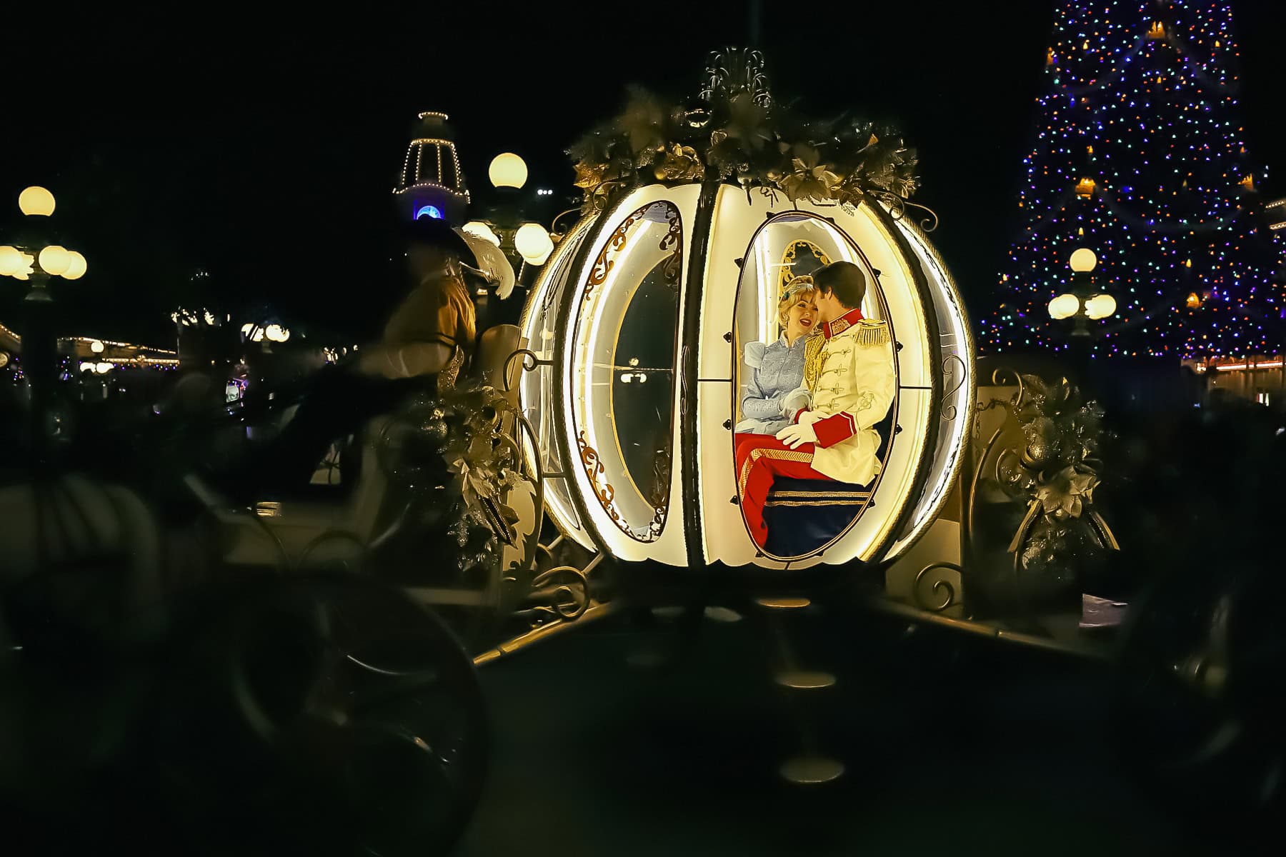 Cinderella and Prince Charming in her coach at Mickey's Very Merry Christmas Party 