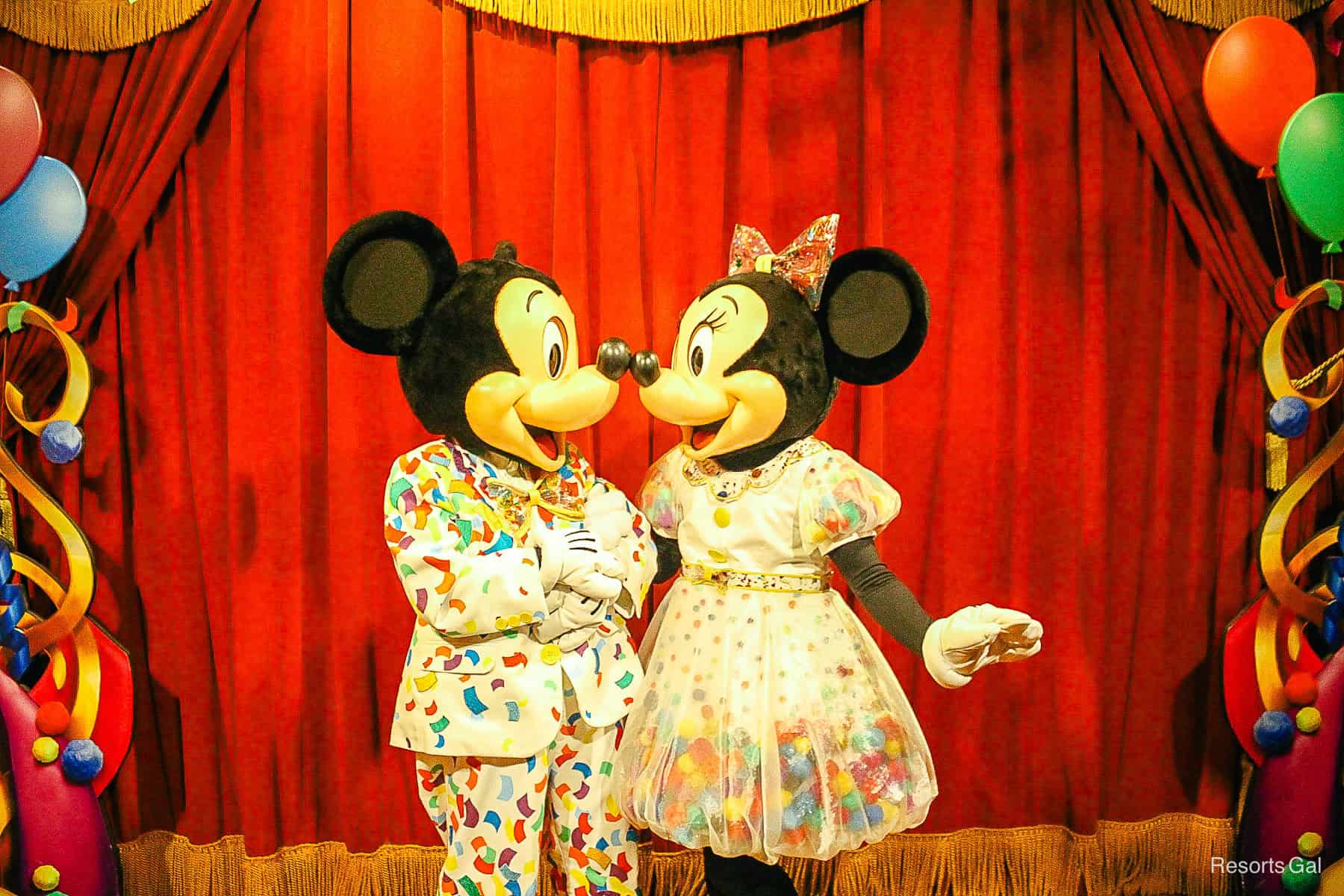 Minnie Mouse in their birthday outfits. 