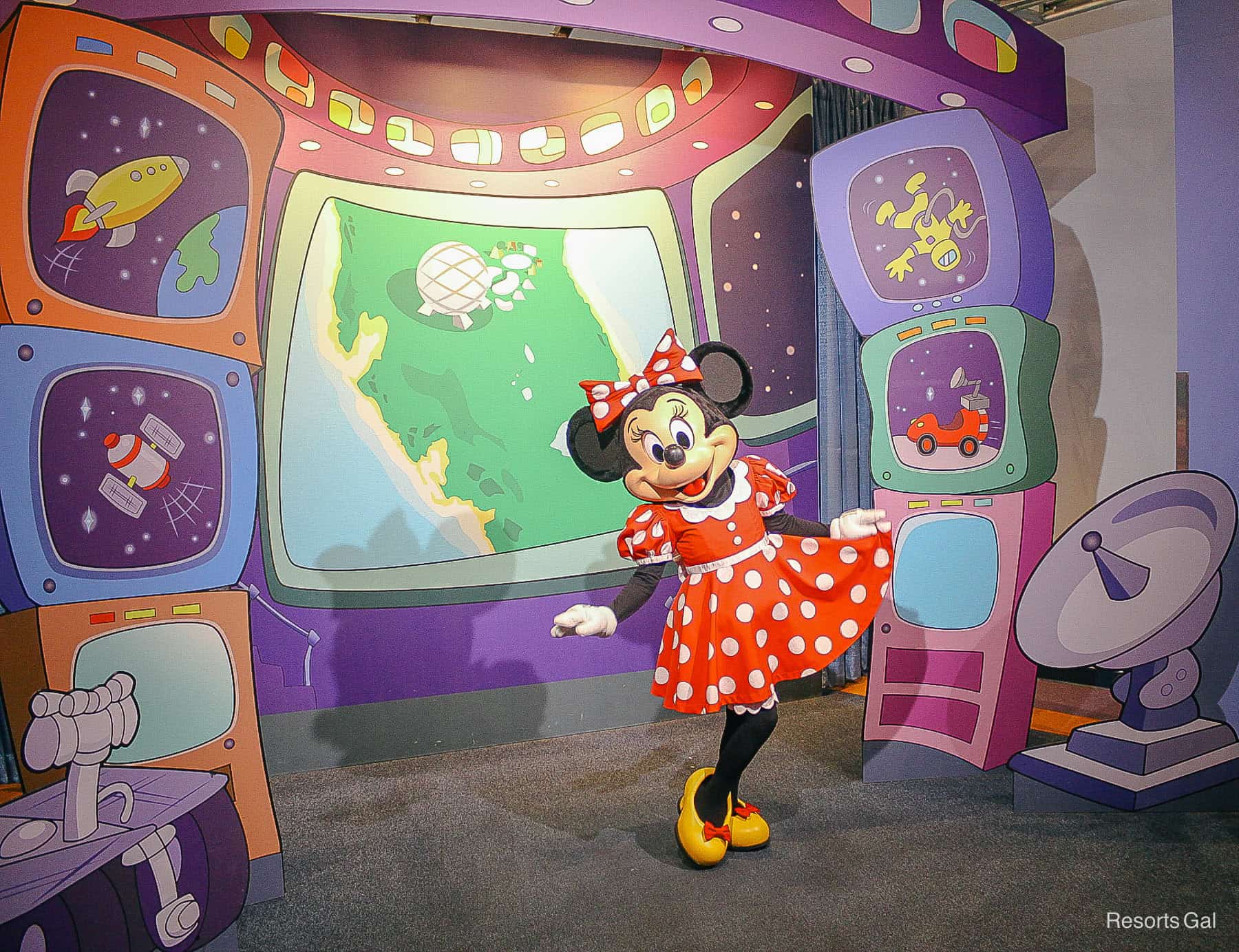 Minnie Mouse in her red and white polka dot dress. 