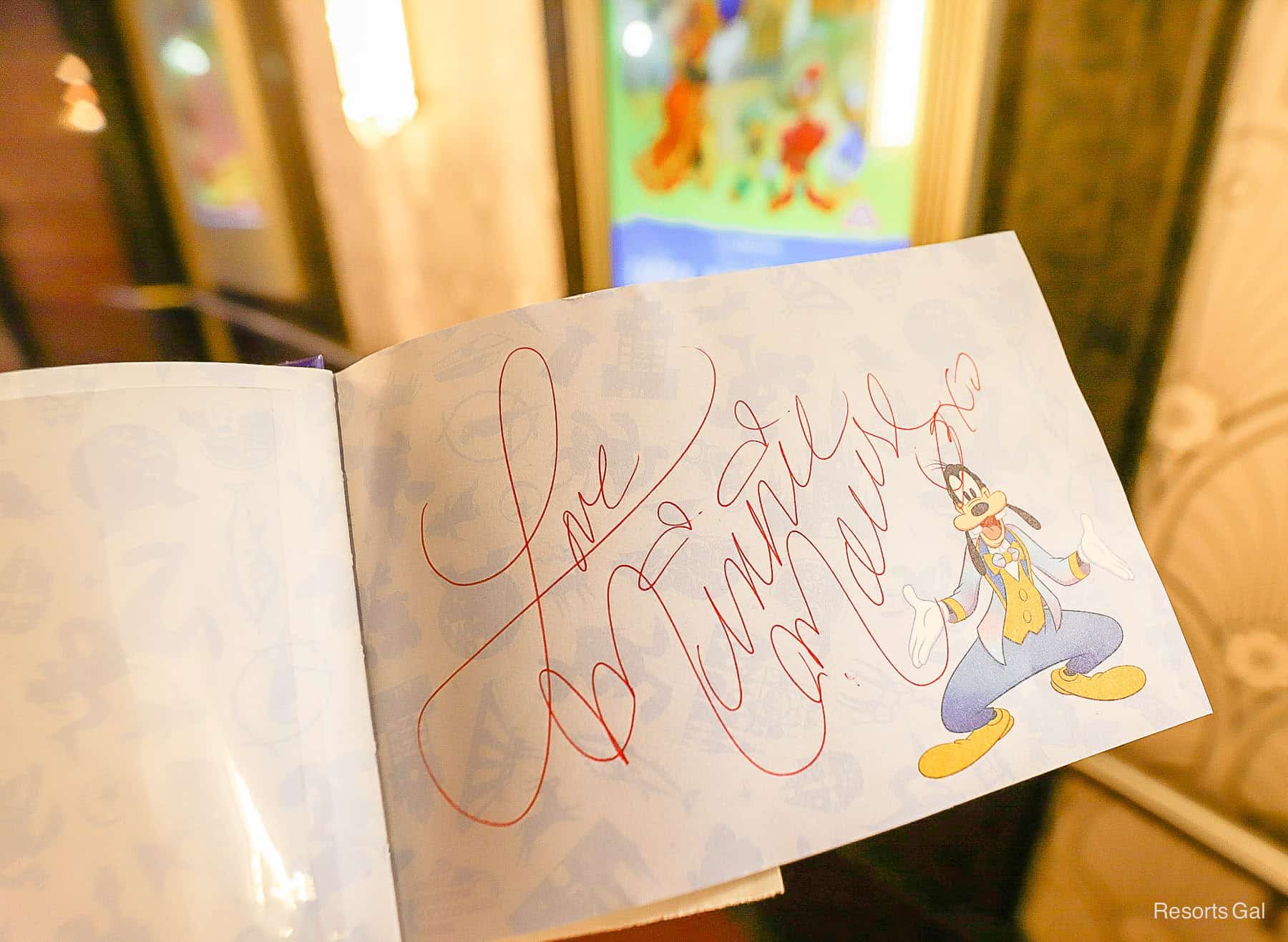 Minnie signs her autograph as Love Minnie Mouse 