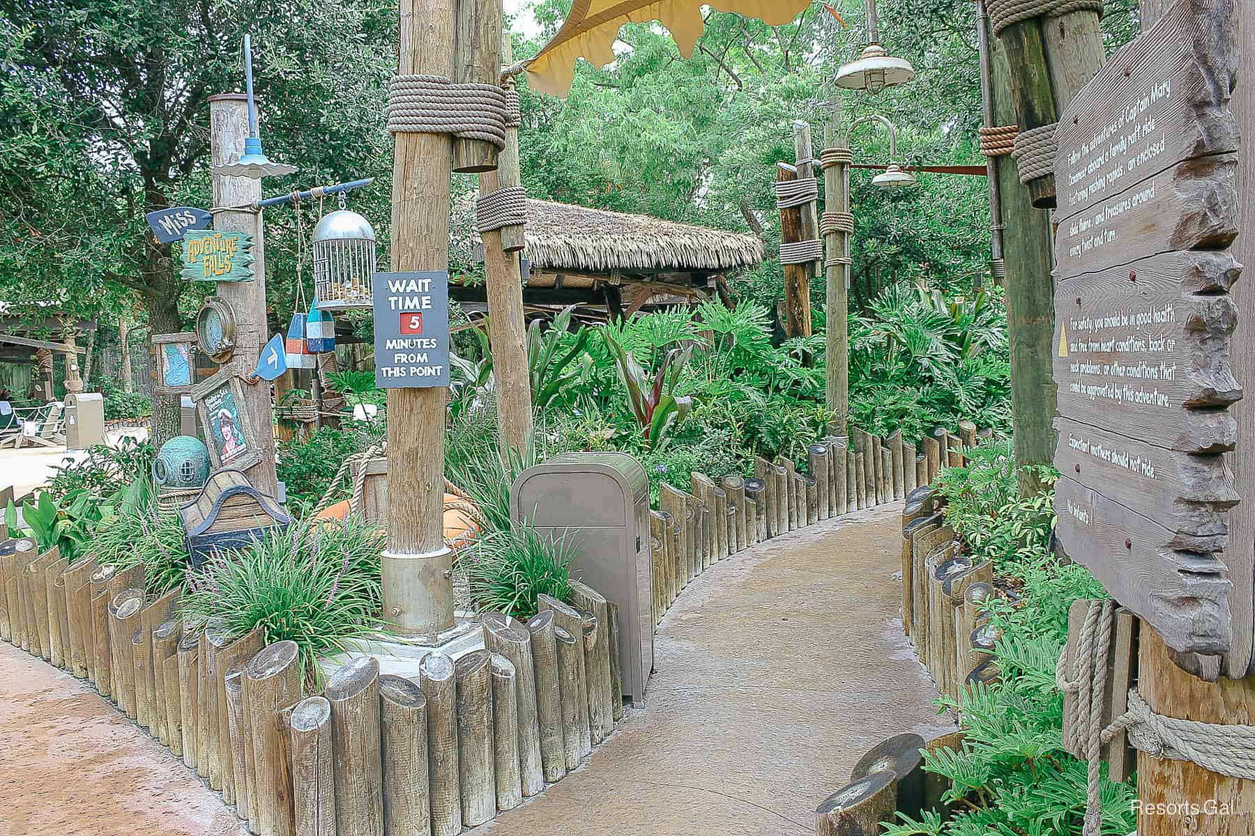 a posted wait time sign for Miss Adventure Falls 