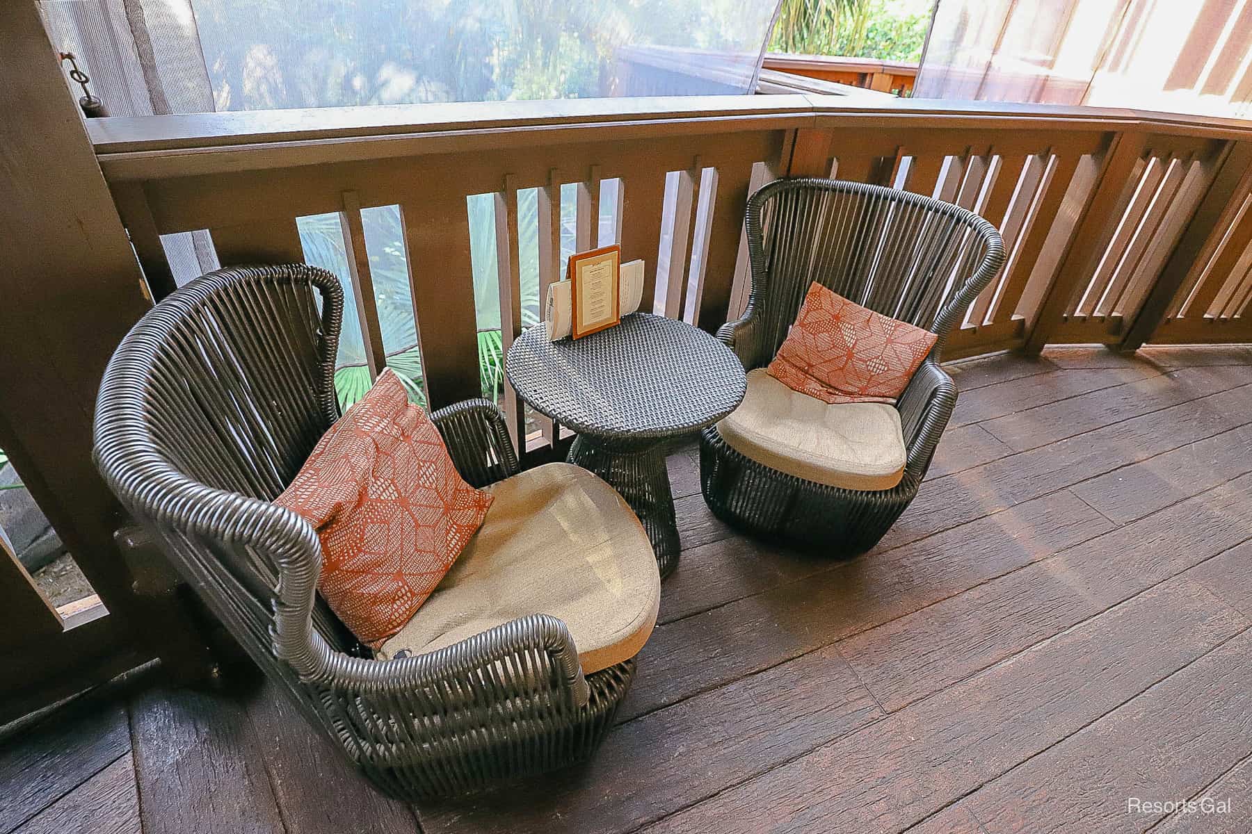 casual seating for two on the deck of Nomad Lounge 